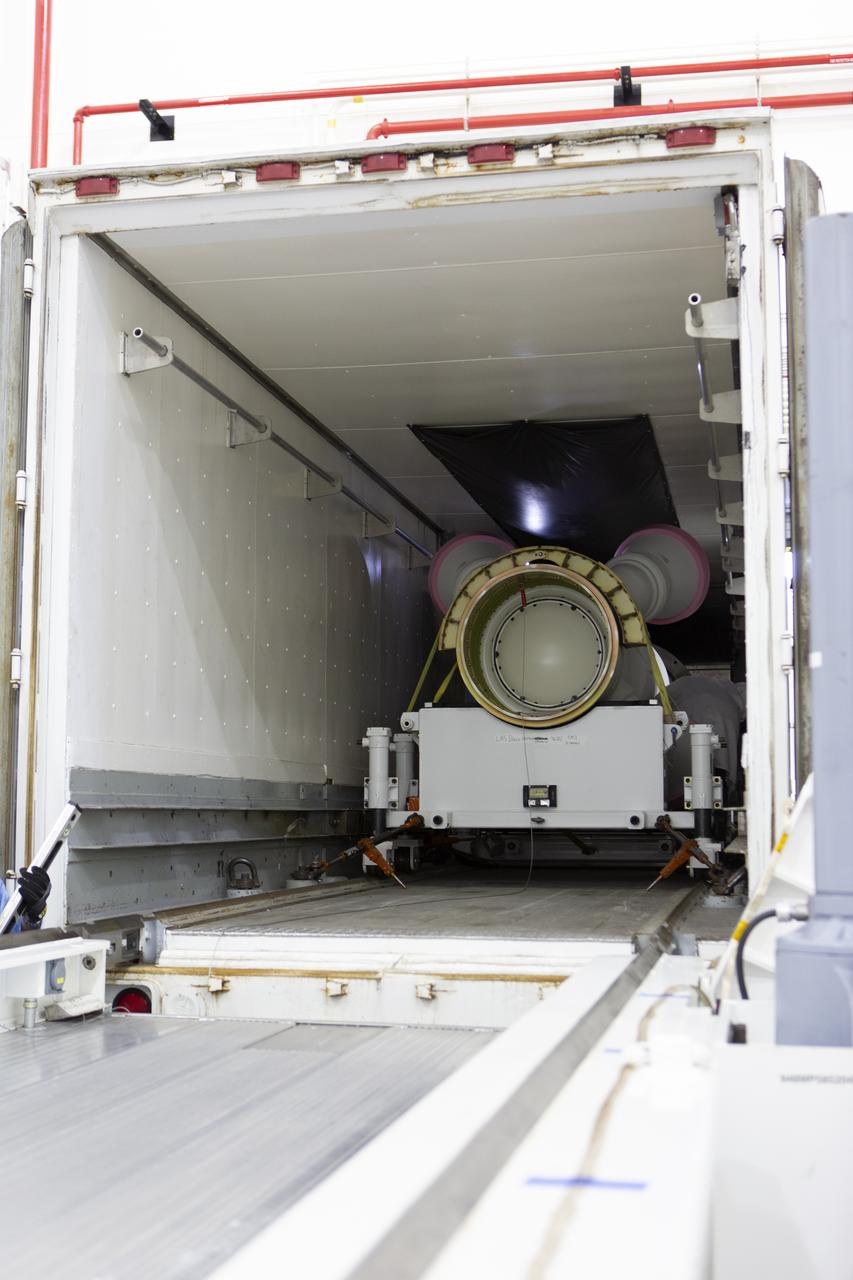 The abort motor for NASA’s Artemis 1 mission, is offloaded from a heavy transport truck inside the Launch Abort System Facility (LASF) at the agency’s Kennedy Space Center in Florida on June 6, 2019. The abort motor, manufactured by Northrop Grumman, will be integrated with Orion subcomponents and prepared for Artemis 1. The abort motor is one of three motors located on the tower of the Launch Abort System (LAS). The LAS is designed to pull the Orion capsule and its crew away to safety if an emergency occurs during ascent of the Space Launch System (SLS) rocket. During Artemis 1, the uncrewed Orion spacecraft will launch atop the SLS from Launch Pad 39B at Kennedy. Orion will embark on an approximately three-week mission that will take the spacecraft thousands of miles past the Moon. Orion will return to Earth and splashdown in the Pacific Ocean off the coast of California, where it will be retrieved and returned to Kennedy.