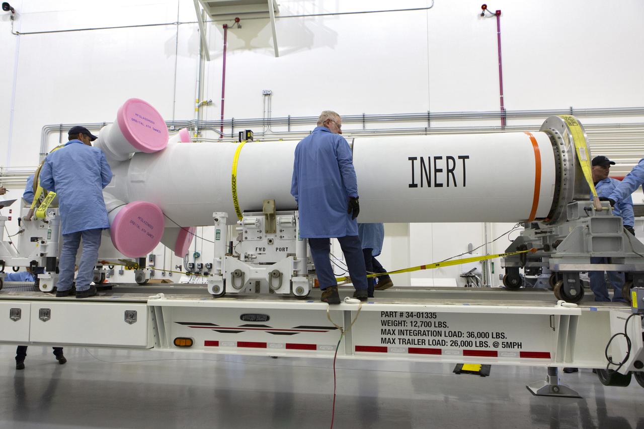 The abort motor for NASA’s Artemis 1 mission is offloaded from a heavy transport truck inside the Launch Abort System Facility (LASF) at the agency’s Kennedy Space Center in Florida on June 6, 2019. The abort motor, manufactured by Northrop Grumman, will be integrated with Orion subcomponents and prepared for Artemis 1. The abort motor is one of three motors located on the tower of the Launch Abort System (LAS). The LAS is designed to pull the Orion capsule and its crew away to safety if an emergency occurs during ascent of the Space Launch System (SLS) rocket. During Artemis 1, the uncrewed Orion spacecraft will launch atop the SLS from Launch Pad 39B at Kennedy. Orion will embark on an approximately three-week mission that will take the spacecraft thousands of miles past the Moon. Orion will return to Earth and splashdown in the Pacific Ocean off the coast of California, where it will be retrieved and returned to Kennedy.