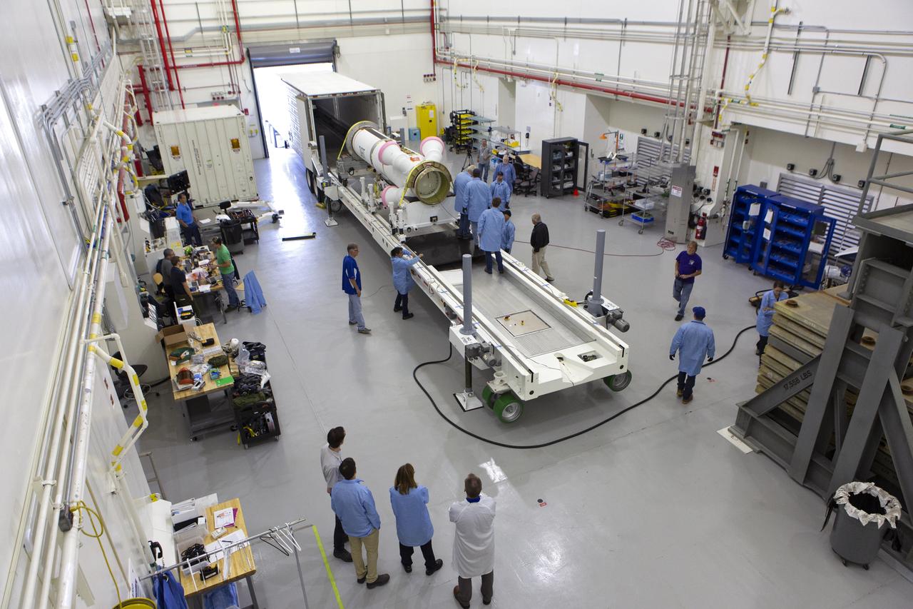 Workers have offloaded the abort motor for NASA’s Artemis 1 mission from a heavy transport truck inside the Launch Abort System Facility (LASF) at the agency’s Kennedy Space Center in Florida on June 6, 2019. The abort motor, manufactured by Northrop Grumman, will be integrated with Orion subcomponents and prepared for Artemis 1. The abort motor is one of three motors located on the tower of the Launch Abort System (LAS). The LAS is designed to pull the Orion capsule and its crew away to safety if an emergency occurs during ascent of the Space Launch System (SLS) rocket. During Artemis 1, the uncrewed Orion spacecraft will launch atop the SLS from Launch Pad 39B at Kennedy. Orion will embark on an approximately three-week mission that will take the spacecraft thousands of miles past the Moon. Orion will return to Earth and splashdown in the Pacific Ocean off the coast of California, where it will be retrieved and returned to Kennedy.