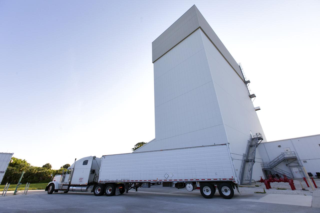The abort motor for NASA’s Artemis 1 mission, secured in a heavy transport truck, arrives at the Launch Abort System Facility (LASF) at the agency’s Kennedy Space Center in Florida on June 6, 2019. The abort motor, manufactured by Northrop Grumman, will be offloaded and moved into the LASF where it will be integrated with Orion subcomponents and prepared for Artemis 1. The abort motor is one of three motors located on the tower of the Launch Abort System (LAS). The LAS is designed to pull the Orion capsule and its crew away to safety if an emergency occurs during ascent of the Space Launch System (SLS) rocket. During Artemis 1, the uncrewed Orion spacecraft will launch atop the SLS from Launch Pad 39B at Kennedy. Orion will embark on an approximately three-week mission that will take the spacecraft thousands of miles past the Moon. Orion will return to Earth and splashdown in the Pacific Ocean off the coast of California, where it will be retrieved and returned to Kennedy.