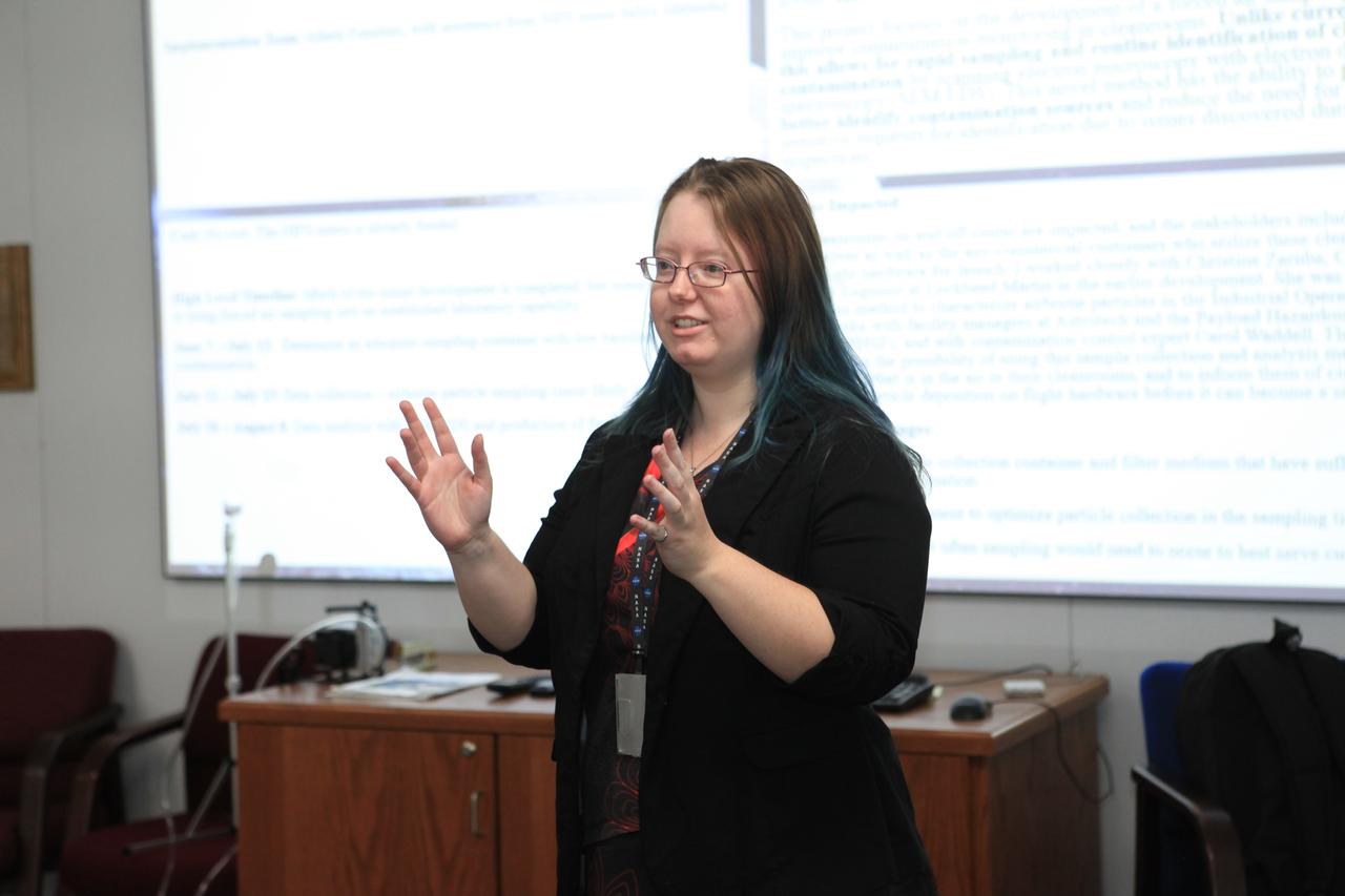 Athela Frandsen, an aerospace technologist with Kennedy Space Center’s analytical laboratories, presents her proposal concerning proactive approaches to cleanroom contamination to representatives from programs across Kennedy during the “Innovation Without Boundaries” event held inside the Space Station Processing Facility in Florida on June 14, 2019. A number of Kennedy employees presented their proposals as part of the Chief Technologist Innovation Call. The event sought out ideas based on relevance, benefit, innovativeness, likelihood of success and sustainability.