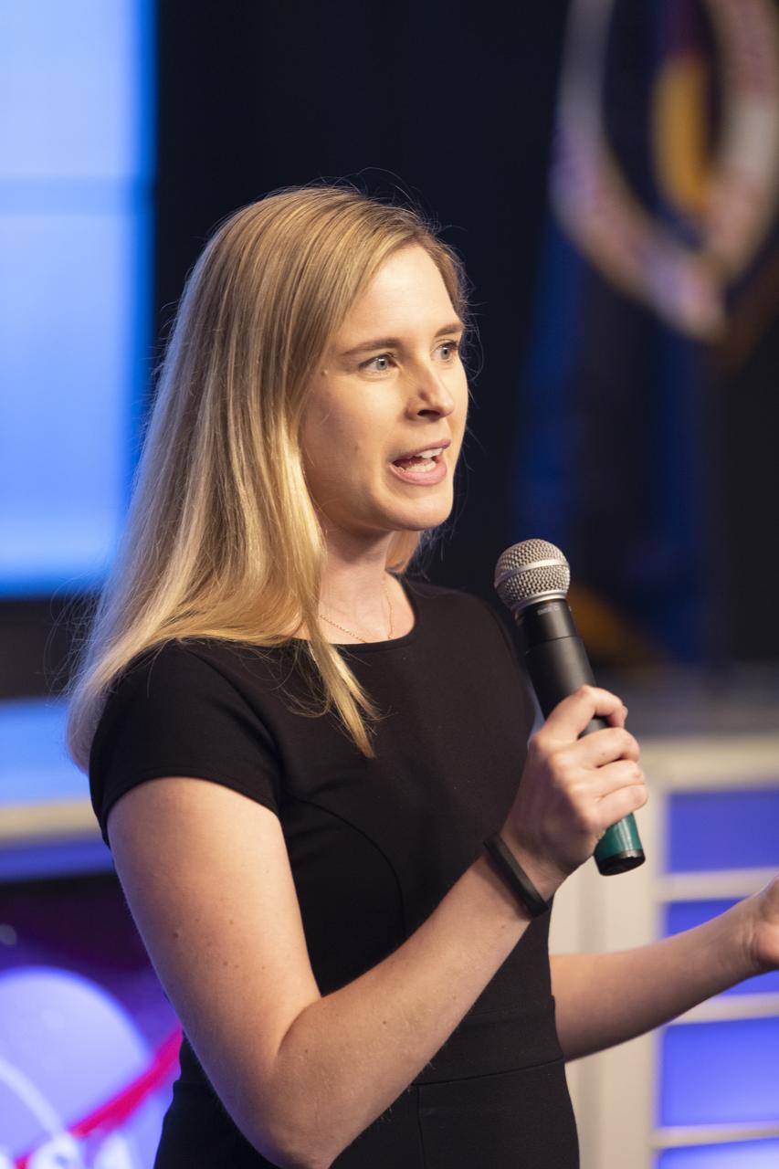 Jill Seubert, deputy principal investigator, from NASAâ€™s Jet Propulsion Laboratory in Pasadena, California, explains the payload during a NASA prelaunch technology TV broadcast for the Space Test Program-2 (STP-2) mission at the agencyâ€™s Kennedy Space Center in Florida on June 23, 2019. The new space clock could improve how we navigate on the Moon, to Mars and beyond. The space clock is one of four NASA payloads scheduled to launch on a SpaceX Falcon Heavy rocket from Launch Complex 39A beginning at 11:30 p.m. EDT on June 24, 2019. STP-2 is managed by the U.S. Air Force Space and Missile Systems Center.