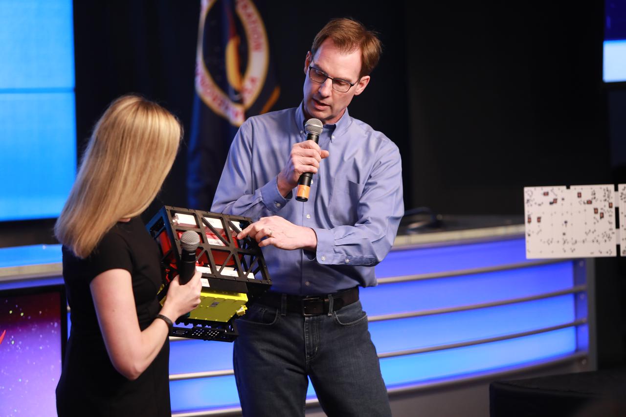 Todd Ely (right), principal investigator for NASA’s Deep Space Atomic Clock, and Deputy Principal Investigator Jill Seubert (left), both from NASA’s Jet Propulsion Laboratory in Pasadena, California, explain the payload during a NASA prelaunch technology TV broadcast for the Space Test Program-2 (STP-2) mission at the agency’s Kennedy Space Center in Florida on June 23, 2019. The new space clock could improve how we navigate on the Moon, to Mars and beyond. The space clock is one of four NASA payloads scheduled to launch on a SpaceX Falcon Heavy rocket from Launch Complex 39A beginning at 11:30 p.m. EDT on June 24, 2019. STP-2 is managed by the U.S. Air Force Space and Missile Systems Center.