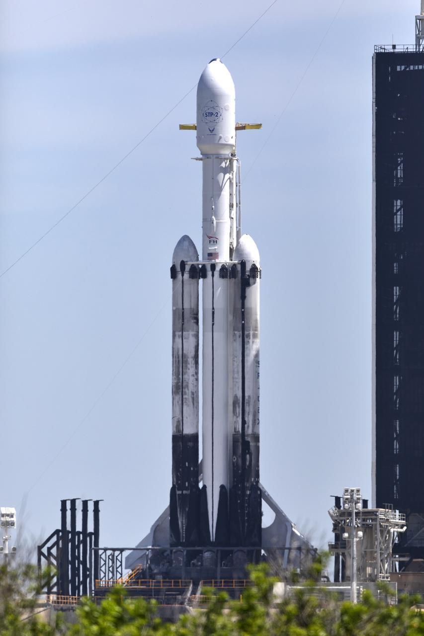 A SpaceX Falcon Heavy rocket is ready for launch on the pad at Launch Complex 39A at NASAâ€™s Kennedy Space Center in Florida on June 24, 2019. SpaceX and the U.S. Department of Defense will launch two dozen satellites to space, including four NASA payloads that are part of the Space Test Program-2, managed by the U.S. Air Force Space and Missile Systems Center. The launch window opens at 11:30 p.m. EDT on June 24. The four NASA payloads include two technology demonstrations to improve how spacecraft propel and navigate, as well as two NASA science missions to help us better understand the nature of space and how it impacts technology on spacecraft and the ground.