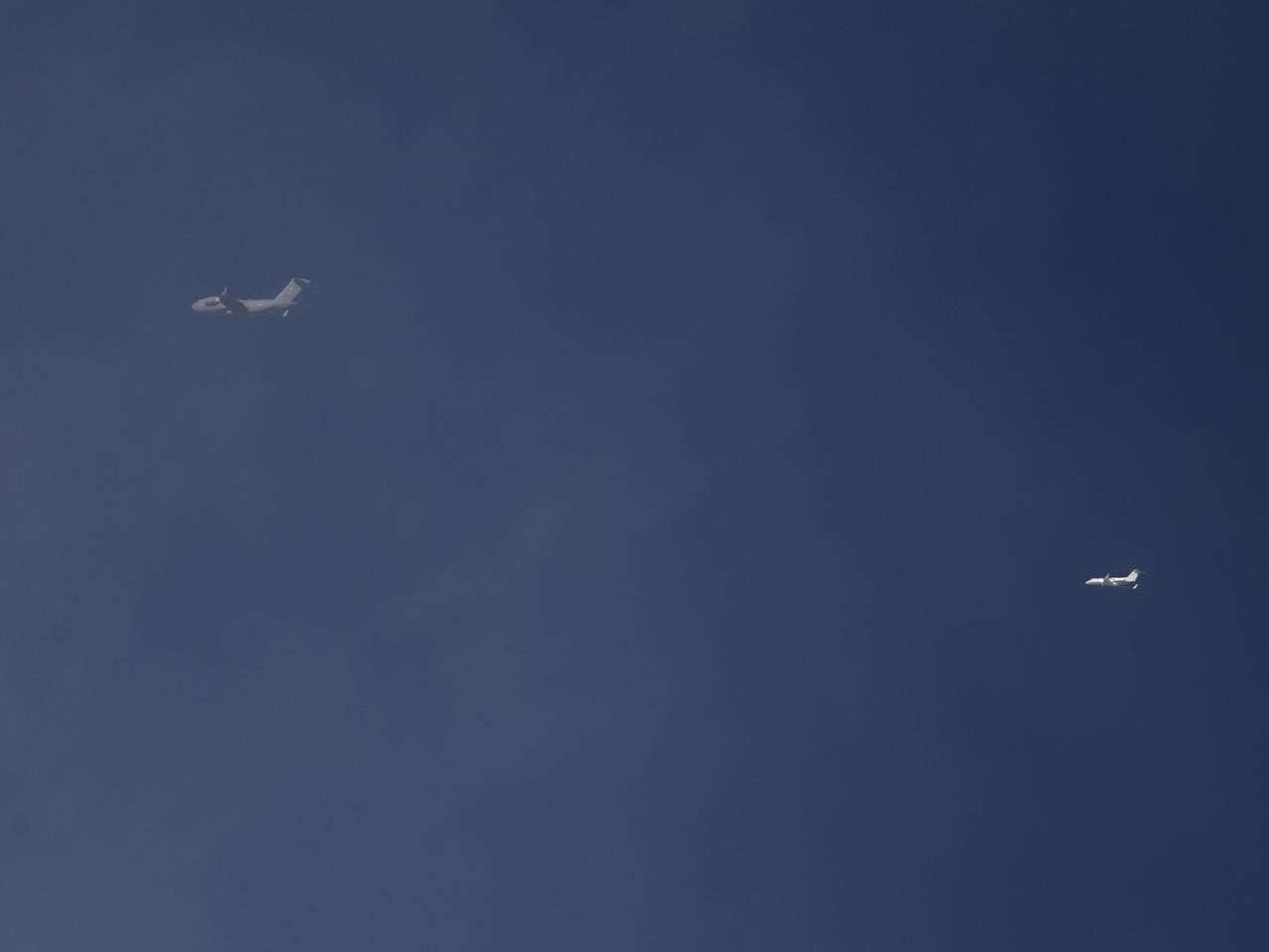 A C-17 aircraft flies above the U.S. Army’s Yuma Proving Ground in Arizona during testing of the Boeing CST-100 Starliner’s parachute system on June 26, 2019. This test, known as a “high Q” test, involved releasing a dart-shaped device – functioning as a Starliner weight simulant – from the aircraft and intentionally inflating the parachutes at higher pressures than expected during missions. The data gathered from this parachute test will help validate the system is safe to carry astronauts to and from the International Space Station as part of NASA’s Commercial Crew Program. Boeing is targeting an uncrewed Orbital Flight Test to the space station this summer, followed by its Crew Flight Test. Starliner will launch atop a United Launch Alliance Atlas V rocket from Space Launch Complex 41 at Cape Canaveral Air Force Station in Florida. 