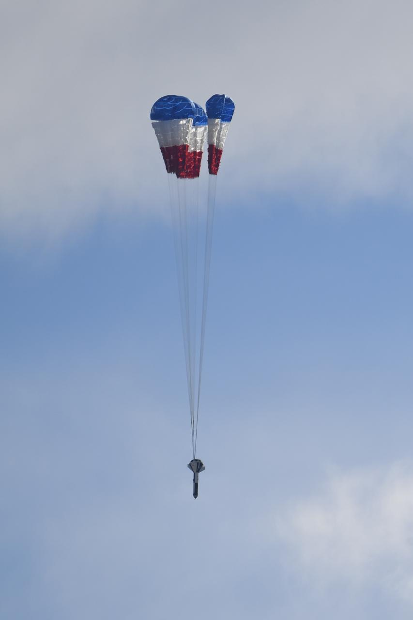 A dart-shaped device, functioning as a Boeing CST-100 Starliner weight simulant, drops from a C-17 aircraft during parachute system testing at the U.S. Army’s Yuma Proving Ground in Arizona on June 26, 2019. This “high Q” test involved intentionally inflating the parachutes at higher pressures than expected during missions, to validate the system is safe to carry astronauts to and from the International Space Station. As part of NASA’s Commercial Crew Program, Boeing is targeting an uncrewed Orbital Flight Test to the space station this summer, followed by its Crew Flight Test. Starliner will launch atop a United Launch Alliance Atlas V rocket from Space Launch Complex 41 at Cape Canaveral Air Force Station in Florida. 