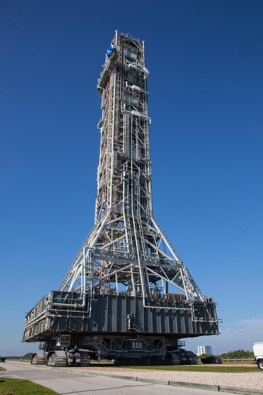 On June 27, 2019, Exploration Ground Systems’ mobile launcher, atop crawler-transporter 2, makes its last solo trek to Kennedy Space Center’s Launch Complex 39B in Florida, where it will remain for the summer, undergoing final testing and checkouts. The mobile launcher departed from the Vehicle Assembly Building at midnight on June 27 for the 10-hour journey to the pad. Its next roll to the pad will be with the agency’s Space Launch System rocket and Orion spacecraft in preparation for the launch of Artemis 1. 