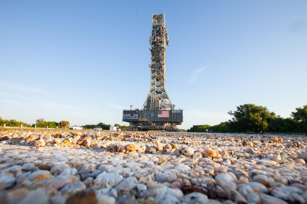 Exploration Ground Systems’ mobile launcher makes its last solo trek along the crawlerway atop crawler-transporter 2 to Kennedy Space Center’s Launch Complex 39B in Florida on June 27, 2019. The mobile launcher departed from the Vehicle Assembly Building at midnight on June 27 for the 10-hour journey to the pad and will remain there for the summer, undergoing final testing and checkouts. Its next roll to the pad will be with the agency’s Space Launch System rocket and Orion spacecraft in preparation for the launch of Artemis 1. 