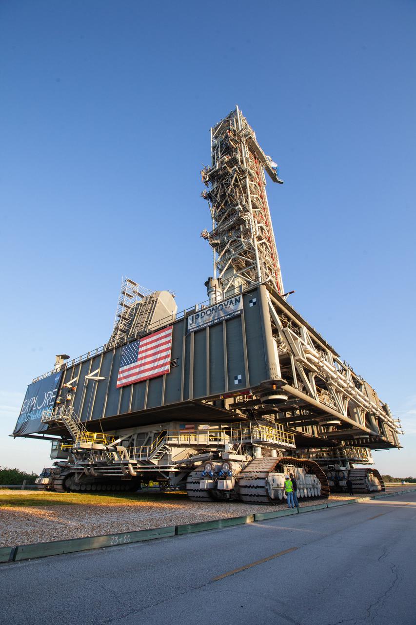 Exploration Ground Systems’ mobile launcher makes its last solo trek along the crawlerway atop crawler-transporter 2 to Kennedy Space Center’s Launch Complex 39B in Florida on June 27, 2019. The mobile launcher departed from the Vehicle Assembly Building at midnight on June 27 for the 10-hour journey to the pad and will remain there for the summer, undergoing final testing and checkouts. Its next roll to the pad will be with the agency’s Space Launch System rocket and Orion spacecraft in preparation for the launch of Artemis 1. 