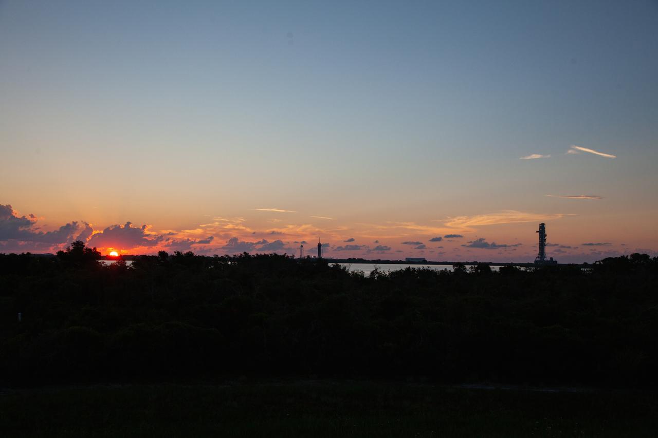 With a sunrise serving as the backdrop, Exploration Ground Systems' mobile launcher makes its last solo trek to Kennedy Space Center’s Launch Complex 39B in Florida on June 27, 2019. It will remain there for the summer, undergoing final testing and checkouts. The mobile launcher departed from the Vehicle Assembly Building at midnight on June 27 for the 10-hour journey to the pad. Its next roll to the pad will be with the agency’s Space Launch System rocket and Orion spacecraft in preparation for the launch of Artemis 1. 