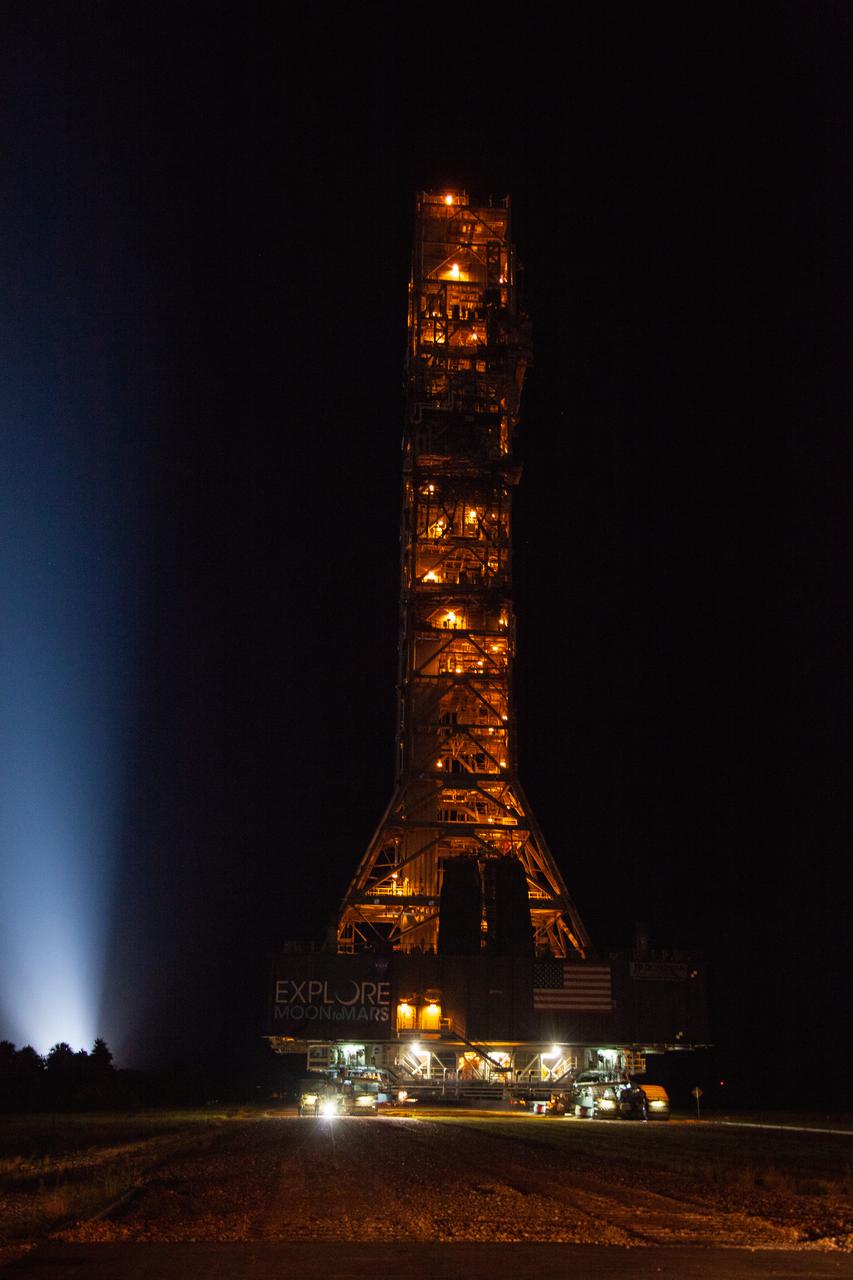 Exploration Ground Systems’ mobile launcher makes its last solo trek along the crawlerway atop crawler-transporter 2 to Kennedy Space Center’s Launch Complex 39B in Florida on June 27, 2019. The mobile launcher departed from the Vehicle Assembly Building at midnight on June 27 for the 10-hour journey to the pad, where it will remain for the summer, undergoing final testing and checkouts. Its next roll to the pad will be with the agency’s Space Launch System rocket and Orion spacecraft in preparation for the launch of Artemis 1. 