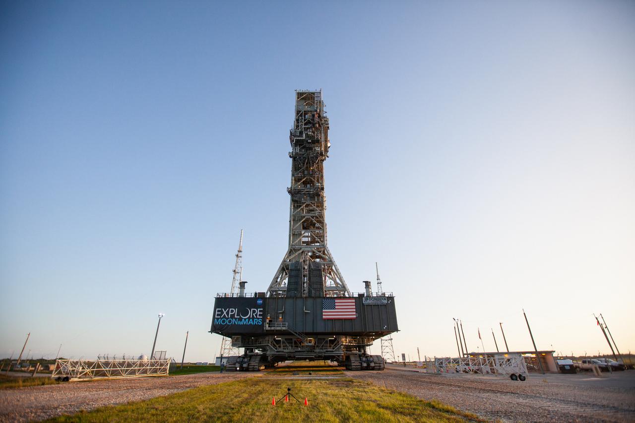 After successfully arriving at Kennedy Space Center’s Launch Complex 39B, Exploration Ground Systems’ mobile launcher continues its journey atop crawler-transporter 2 up to the pad surface on June 28, 2019. The mobile launcher began its final solo trek to the pad at midnight on June 27, departing from NASA’s Vehicle Assembly Building. The mobile launcher will remain at the pad over the summer, undergoing final testing and checkouts. Its next roll to the pad will be with the agency’s Space Launch System rocket and Orion in preparation for the launch of Artemis 1.