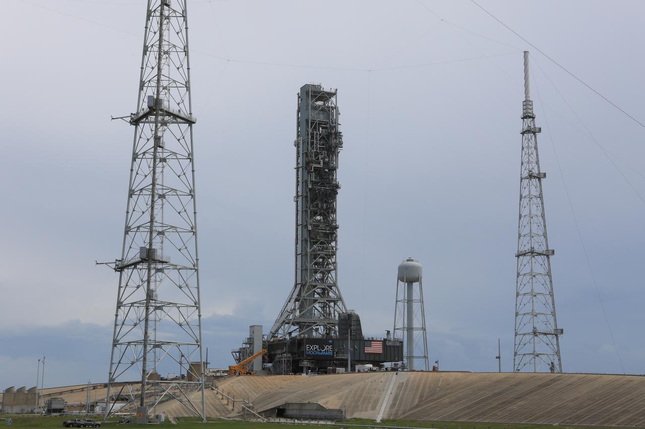 After successfully arriving at Kennedy Space Center’s Launch Complex 39B, Exploration Ground Systems’ mobile launcher is photographed at the pad surface on June 28, 2019. The mobile launcher began its final solo trek to the pad at midnight on June 27, departing from NASA’s Vehicle Assembly Building. The mobile launcher will remain at the pad over the summer, undergoing final testing and checkouts. Its next roll to the pad will be with the agency’s Space Launch System rocket and Orion in preparation for the launch of Artemis 1.