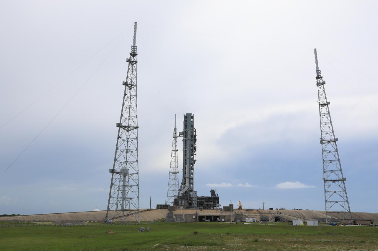 After successfully arriving at Kennedy Space Center’s Launch Complex 39B, Exploration Ground Systems’ mobile launcher is photographed at the pad surface on June 28, 2019. The mobile launcher began its final solo trek to the pad at midnight on June 27, departing from NASA’s Vehicle Assembly Building. The mobile launcher will remain at the pad over the summer, undergoing final testing and checkouts. Its next roll to the pad will be with the agency’s Space Launch System rocket and Orion in preparation for the launch of Artemis 1.