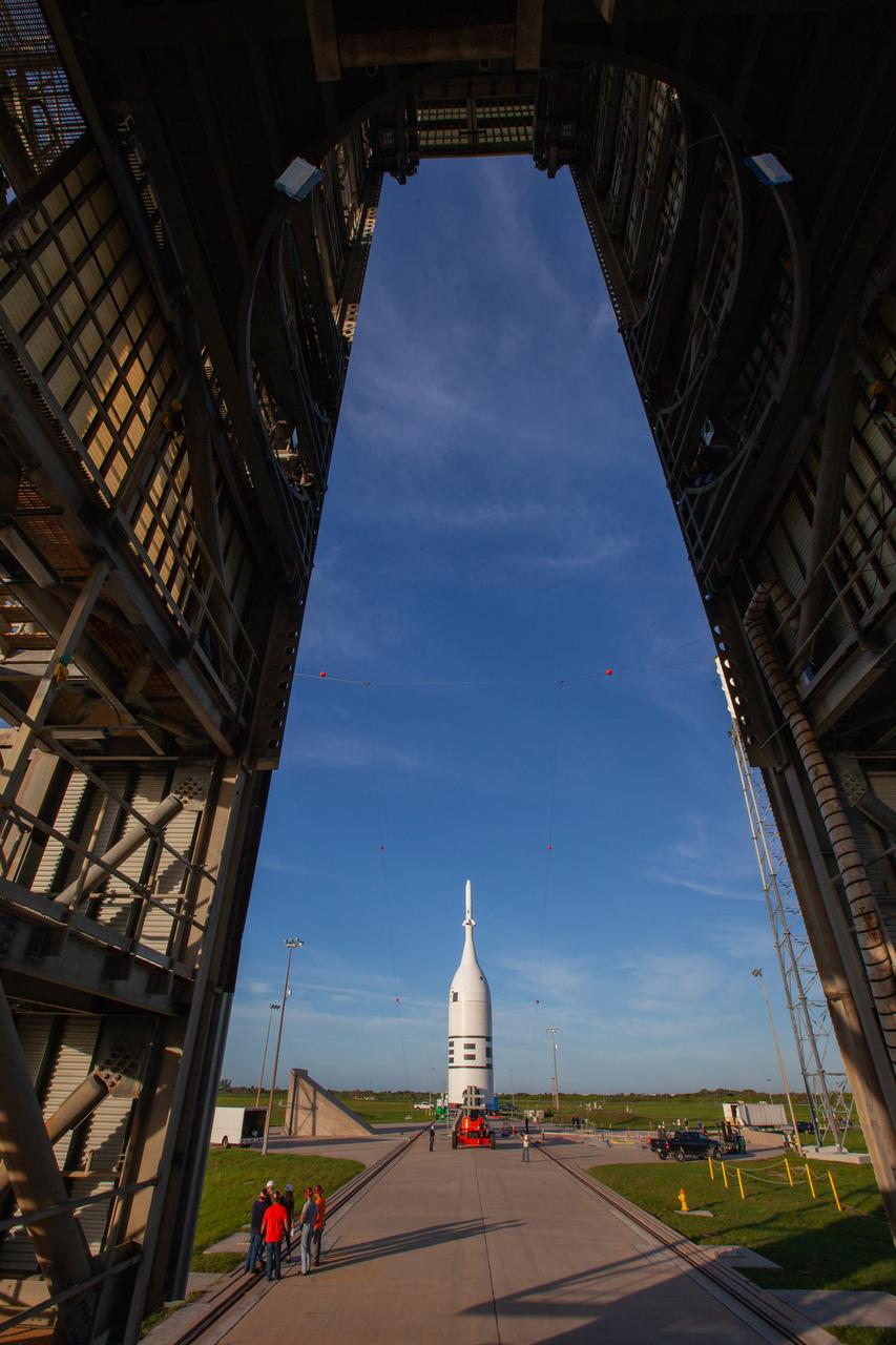 A view of the Ascent Abort-2 (AA-2) test vehicle from inside the vertical integration facility at Launch Complex 46 at Cape Canaveral Air Force Station in Florida after rollback of the integration facility on July 1, 2019. A fully functional Launch Abort System (LAS) mated to a test version of the Orion spacecraft are on a Northrop Grumman provided booster on the pad for launch on NASA’s AA-2 flight test on July 2, 2019. During AA-2, the booster will send the LAS and Orion to an altitude of 31,000 feet, traveling at more than 1,000 mph. The LAS’ three motors will work together to pull the crew module away from the booster and prepare it for splashdown in the Atlantic Ocean. The flight test will prove that the abort system can pull crew to safety in the unlikely event of an emergency during ascent.