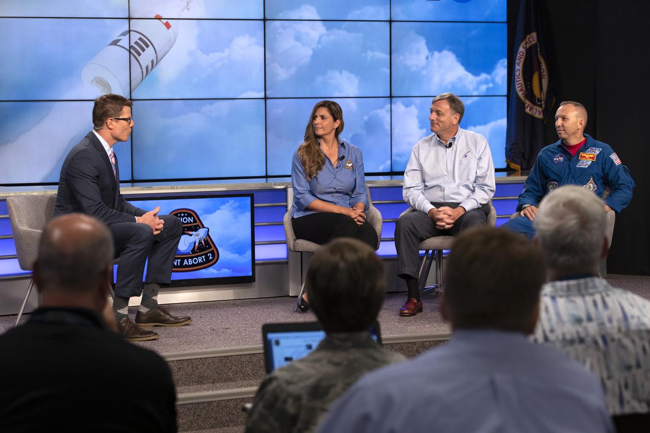 From left, Derrol Nail, NASA Communications, moderates a prelaunch news conference on July 1, 2019, for the agency’s Ascent Abort-2 (AA-2) flight test, with Jenny Devolites, AA-2 Crew Module manager; Mark Kirasich, Orion Program manager; and Randy Bresnik, NASA astronaut, at Kennedy Space Center in Florida. For AA-2, a test version of the Orion spacecraft attached to a fully functional Launch Abort System (LAS) will launch atop a Northrop Grumman provided booster on July 2, 2019, from Launch Pad 46 at Cape Canaveral Air Force Station in Florida. During AA-2, the booster will send the LAS and Orion to an altitude of 31,000 feet, traveling at more than 1,000 mph. The LAS’ three motors will work together to pull the crew module away from the booster and prepare it for splashdown in the Atlantic Ocean. The flight test will prove that the abort system can pull crew to safety in the unlikely event of an emergency during ascent.