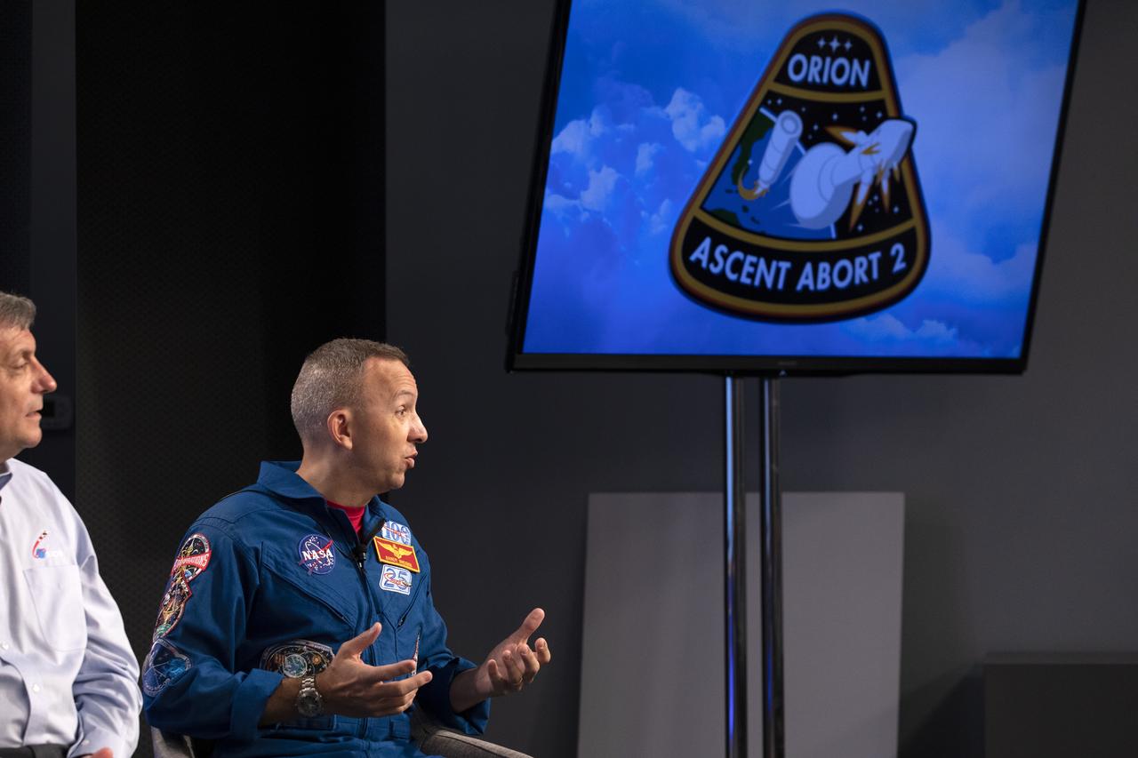 From left, Mark Kirasich, Orion Program manager; and Randy Bresnik, NASA astronaut, participate in a prelaunch news conference for NASA’s Ascent Abort-2 (AA-2) flight test at the agency’s Kennedy Space Center in Florida on July 1, 2019. For AA-2, a test version of the Orion spacecraft attached to a fully functional Launch Abort System (LAS) will launch atop a Northrop Grumman provided booster on July 2, 2019, from Launch Pad 46 at Cape Canaveral Air Force Station in Florida. During AA-2, the booster will send the LAS and Orion to an altitude of 31,000 feet, traveling at more than 1,000 mph. The LAS’ three motors will work together to pull the crew module away from the booster and prepare it for splashdown in the Atlantic Ocean. The flight test will prove that the abort system can pull crew to safety in the unlikely event of an emergency during ascent. 