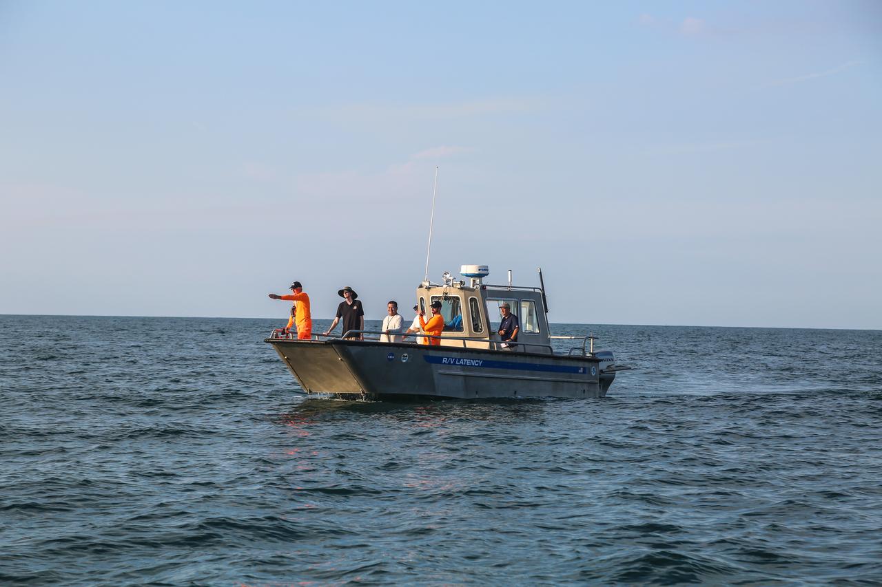 Members of the NASA Ejectable Data Recorder Recovery Team search for the ejectable data recorders in the Atlantic Ocean off the coast of Florida on July 2, 2019, after the Ascent Abort-2 (AA-2) flight test. During AA-2, a fully functional Launch Abort System (LAS) with a test version of Orion attached, launched atop a Northrop Grumman provided booster from Launch Pad 46 at Cape Canaveral Air Force Station on July 2, 2019. Liftoff was at 7 a.m. EDT. During AA-2, the booster sent the LAS and Orion to an altitude of 31,000 feet, traveling at Mach 1.15 (more than 1,000 mph). The LAS’ three motors worked together to pull the crew module away from the booster and prepare it for splashdown in the Atlantic Ocean. The flight test proves that the abort system can pull crew to safety in the unlikely event of an emergency during ascent. Data from the recorders will be analyzed by engineers.