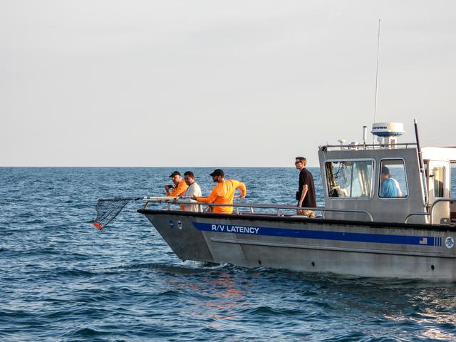 NASA image: NASA AA-2 team recovering EDRs in the open water