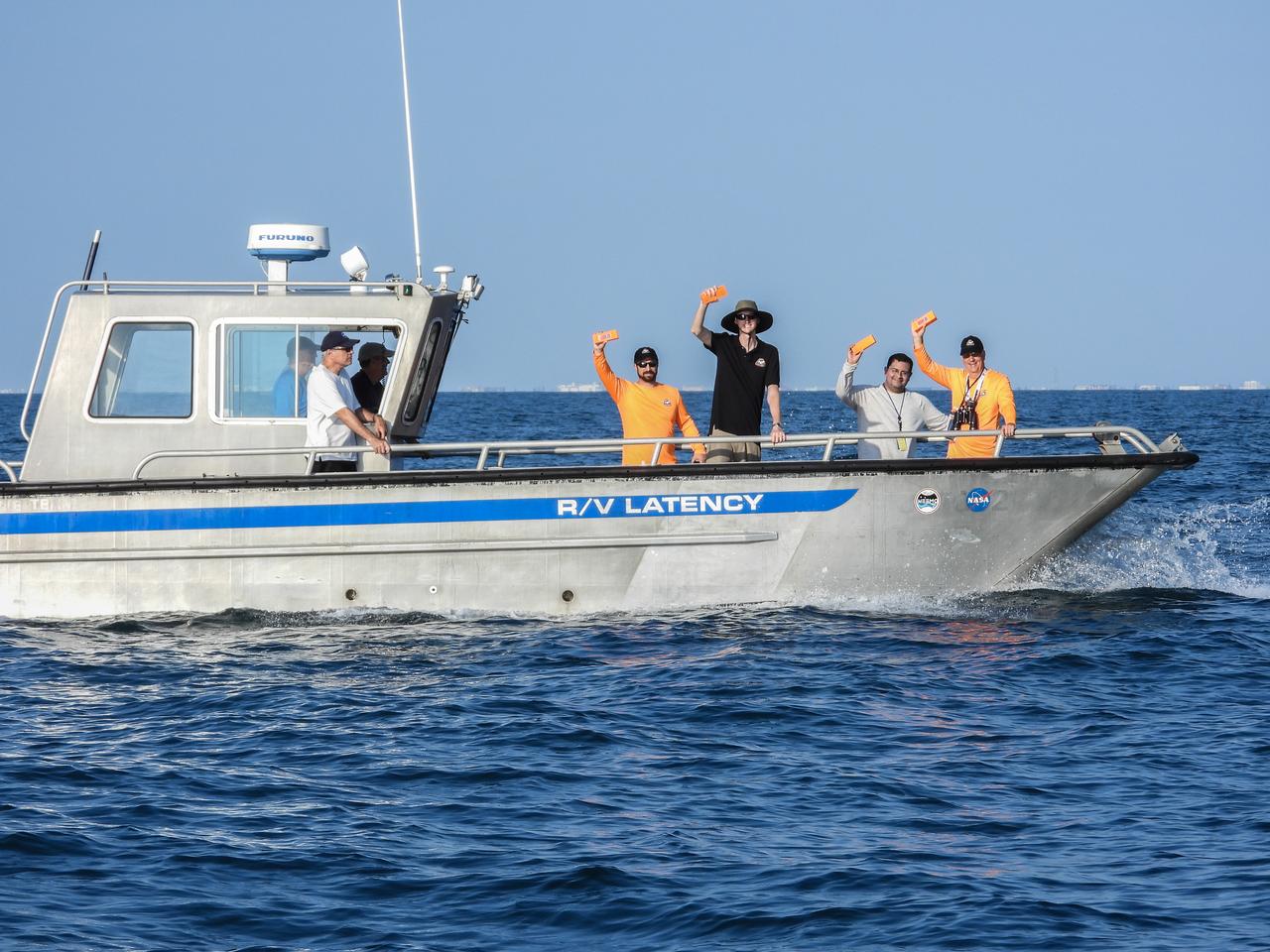 Members of the NASA Ejectable Data Recorder Recovery Team display some of the ejectable data recorders they recovered in the Atlantic Ocean off the coast of Florida on July 2, 2019, after the Ascent Abort-2 (AA-2) flight test. During AA-2, a fully functional Launch Abort System (LAS) with a test version of Orion attached, launched atop a Northrop Grumman provided booster from Launch Pad 46 at Cape Canaveral Air Force Station on July 2, 2019. Liftoff was at 7 a.m. EDT. During AA-2, the booster sent the LAS and Orion to an altitude of 31,000 feet, traveling at Mach 1.15 (more than 1,000 mph). The LAS’ three motors worked together to pull the crew module away from the booster and prepare it for splashdown in the Atlantic Ocean. The flight test proves that the abort system can pull crew to safety in the unlikely event of an emergency during ascent. Data from the recorders will be analyzed by engineers.