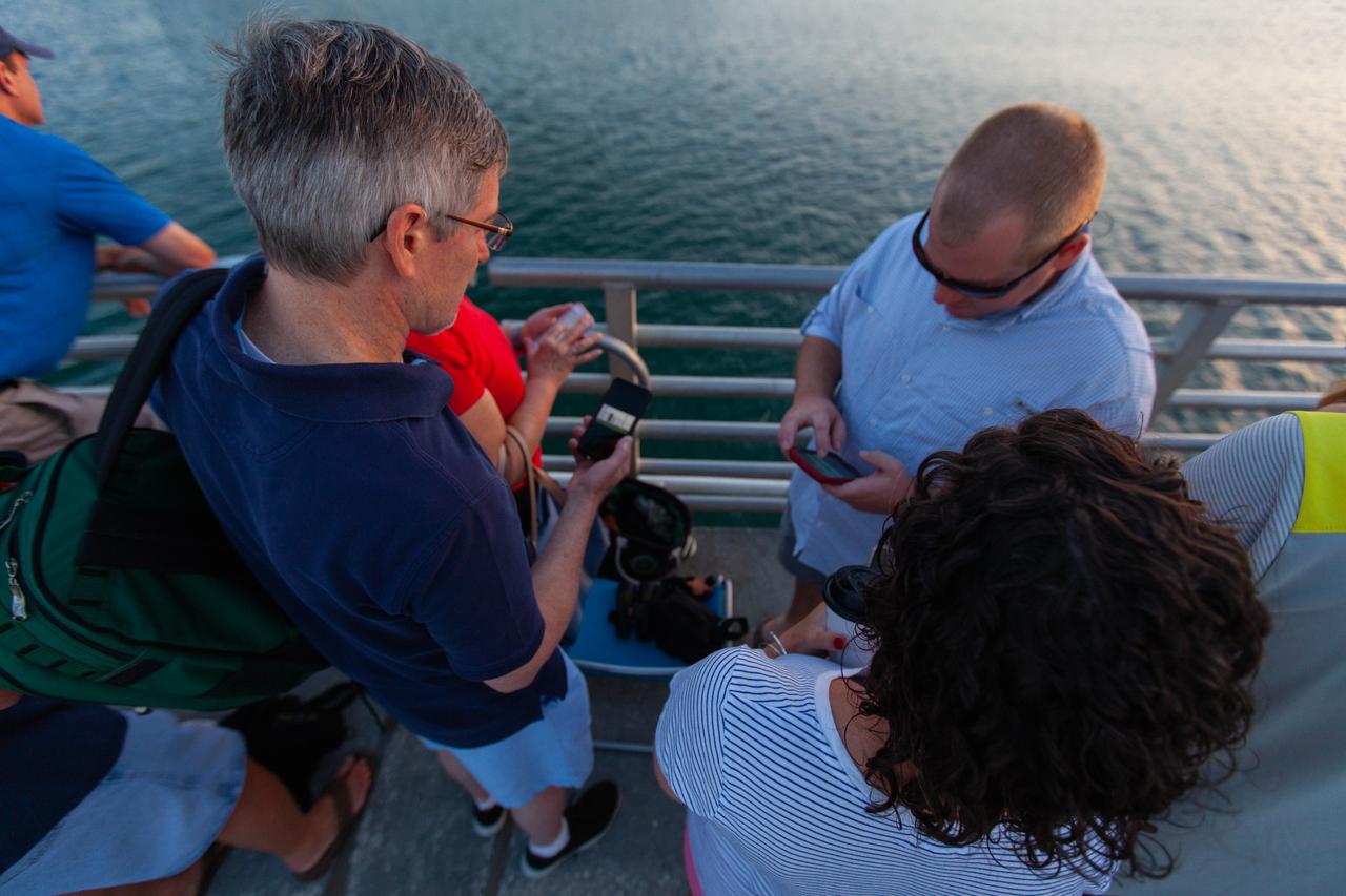 Crowds of spectators watch from Jetty Park in Cape Canaveral, Florida, on July 2, 2019, as a Northrop Grumman provided booster launches from Launch Pad 46 carrying, a fully functional Launch Abort System with a test version of Orion attached for NASA’s Ascent Abort-2 (AA-2). Launch time was 7 a.m. EDT. During AA-2, the booster will send the LAS and Orion to an altitude of 31,000 feet, traveling at Mach 1.15 (more than 1,000 mph). The LAS’ three motors will work together to pull the crew module away from the booster and prepare it for splashdown in the Atlantic Ocean. The flight test will prove that the abort system can pull crew to safety in the unlikely event of an emergency during ascent.