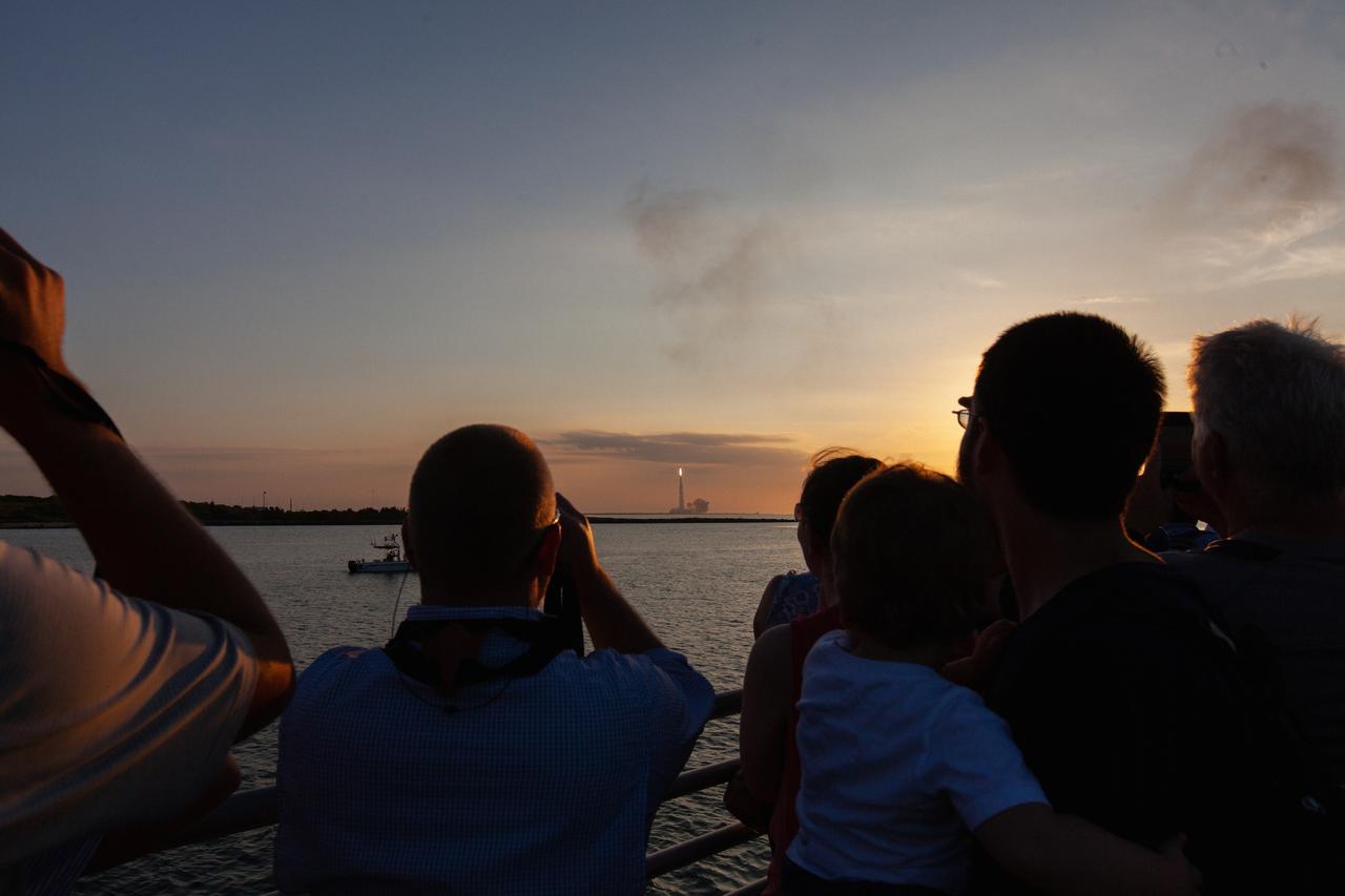 Crowds of spectators watch from Jetty Park in Cape Canaveral, Florida, on July 2, 2019, as a Northrop Grumman provided booster launches from Launch Pad 46 carrying, a fully functional Launch Abort System with a test version of Orion attached for NASA’s Ascent Abort-2 (AA-2). Launch time was 7 a.m. EDT. During AA-2, the booster will send the LAS and Orion to an altitude of 31,000 feet, traveling at Mach 1.15 (more than 1,000 mph). The LAS’ three motors will work together to pull the crew module away from the booster and prepare it for splashdown in the Atlantic Ocean. The flight test will prove that the abort system can pull crew to safety in the unlikely event of an emergency during ascent.