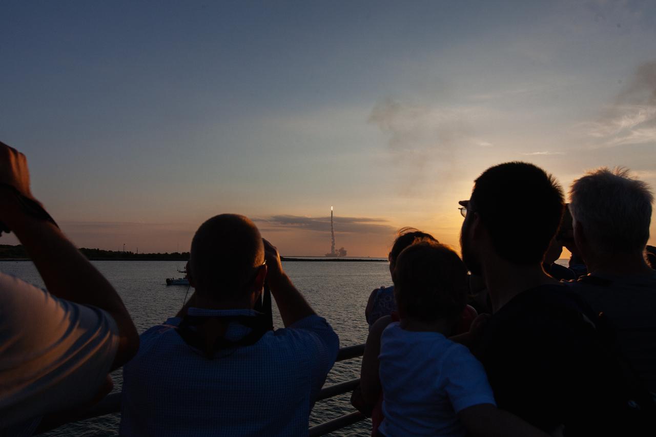 Crowds of spectators watch from Jetty Park in Cape Canaveral, Florida, on July 2, 2019, as a Northrop Grumman provided booster launches from Launch Pad 46 carrying, a fully functional Launch Abort System with a test version of Orion attached for NASA’s Ascent Abort-2 (AA-2). Launch time was 7 a.m. EDT. During AA-2, the booster will send the LAS and Orion to an altitude of 31,000 feet, traveling at Mach 1.15 (more than 1,000 mph). The LAS’ three motors will work together to pull the crew module away from the booster and prepare it for splashdown in the Atlantic Ocean. The flight test will prove that the abort system can pull crew to safety in the unlikely event of an emergency during ascent.