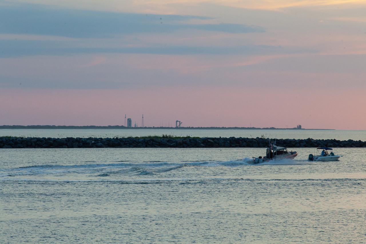 A view of Jetty Park in Cape Canaveral, Florida, during sunrise on July 2, 2019. Crowds will soon gather to watch as a Northrop Grumman provided booster launches from Launch Pad 46, carrying a fully functional Launch Abort System with a test version of Orion attached for NASA’s Ascent Abort-2 (AA-2). Launch time was 7 a.m. EDT. During AA-2, the booster will send the LAS and Orion to an altitude of 31,000 feet, traveling at Mach 1.15 (more than 1,000 mph). The LAS’ three motors will work together to pull the crew module away from the booster and prepare it for splashdown in the Atlantic Ocean. The flight test will prove that the abort system can pull crew to safety in the unlikely event of an emergency during ascent.