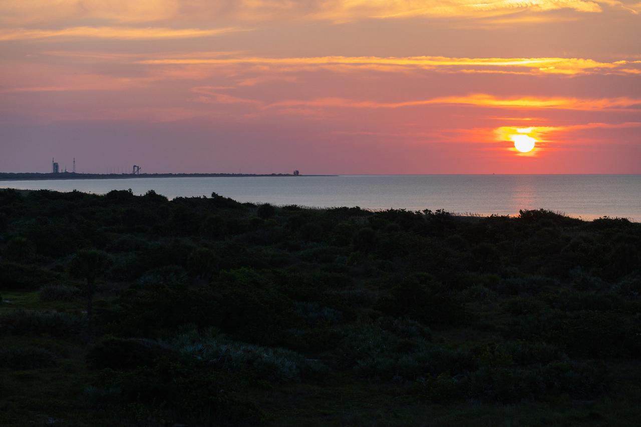 A brilliant sunrise fills the sky before a fully functional Launch Abort System (LAS) with a test version of Orion attached, launches on NASA’s Ascent Abort-2 (AA-2) atop a Northrop Grumman provided booster on July 2, 2019, at 7 a.m. EDT, from Launch Pad 46 at Cape Canaveral Air Force Station in Florida. During AA-2, the booster will send the LAS and Orion to an altitude of 31,000 feet, traveling at Mach 1.15 (more than 1,000 mph). The LAS’ three motors will work together to pull the crew module away from the booster and prepare it for splashdown in the Atlantic Ocean. The flight test will prove that the abort system can pull crew to safety in the unlikely event of an emergency during ascent. 