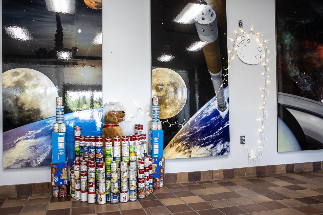 A sculpture created out of non-perishable canned and boxed foods is on display at NASA’s Kennedy Space Center in Florida as part of the 2019 Feds Feeds Families campaign. Kennedy employees had the opportunity to work in teams to construct sculptures reflecting this year’s theme – The Moon Lights the Way – to pay tribute to the 50th anniversary of the first Apollo Moon landing. As part of the theme, the can sculptures highlighted the accomplishments of the Apollo Program while incorporating aspects of NASA’s aim to return to the Moon and beyond to Mars. On Aug. 2, 2019, all sculptures will be deconstructed and boxed for donation. 