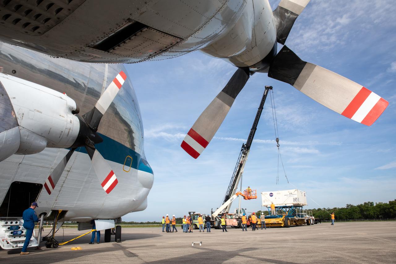 The shipping container carrying the heat shield for Orion’s Artemis 2 mission, NASA’s first crewed mission, has been unloaded from NASA’s Super Guppy aircraft at the agency’s Kennedy Space Center Shuttle Landing Facility in Florida on July 9, 2019. The heat shield, measuring roughly 16 feet in diameter, will protect astronauts upon re-entry on the second mission of Artemis. The heat shield arrived from Lockheed Martin’s manufacturing facility near Denver. It will be delivered to the Neil Armstrong Operations and Checkout facility high bay. The heat shield is a base titanium truss structure. Over the next several months, technicians will apply Avcoat, an ablative material that will provide the thermal protection. Artemis 2 will confirm all of the spacecraft’s systems operate as designed in the actual environment of deep space with astronauts aboard.