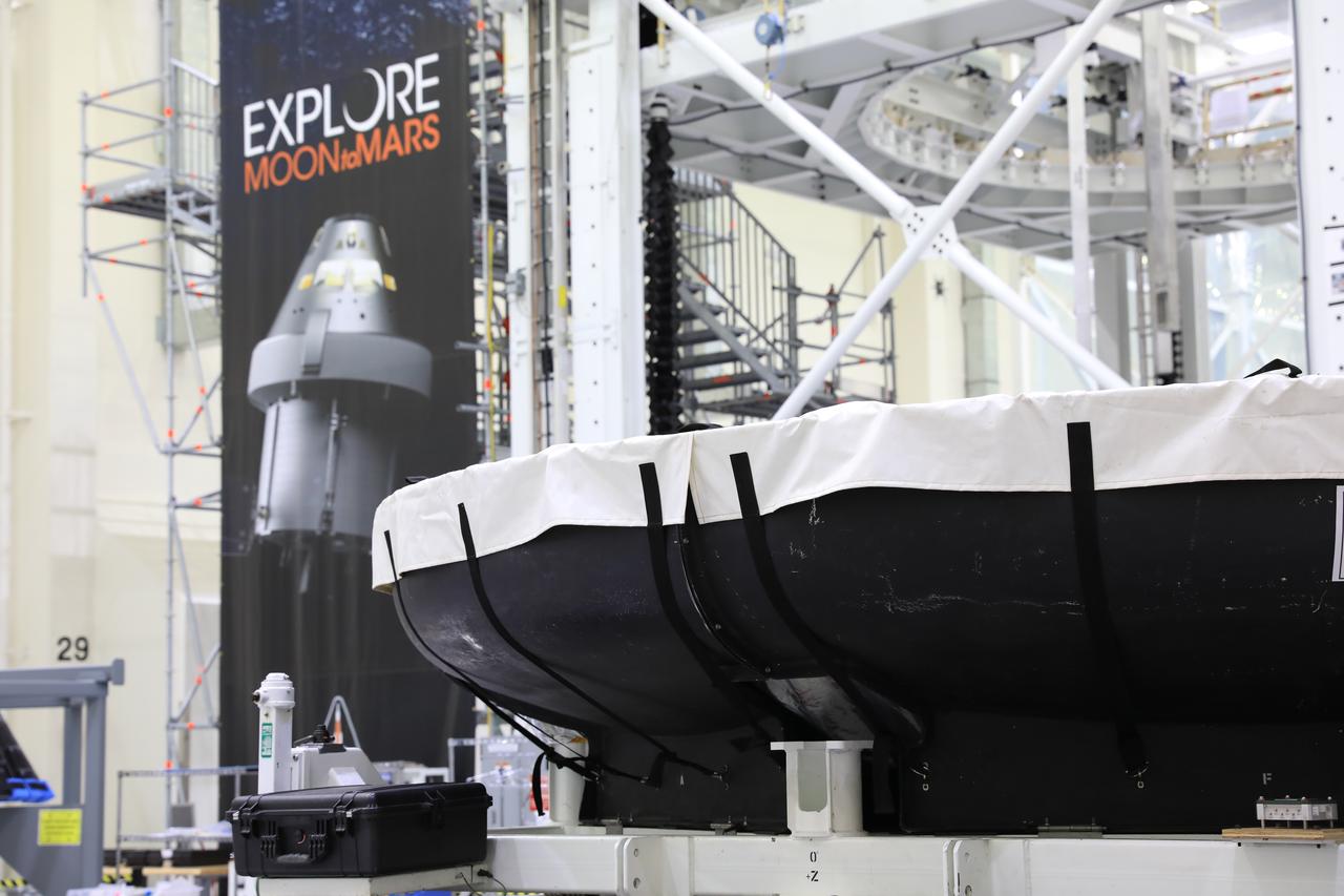 The heat shield for Orion’s Artemis 2 mission, NASA’s first crewed mission, is uncrated from its shipping container inside the Neil Armstrong Operations and Checkout Building high bay at the agency’s Kennedy Space Center in Florida on July 10, 2019. The heat shield, measuring roughly 16 feet in diameter, will protect astronauts upon re-entry on the second mission of Artemis. The heat shield arrived from Lockheed Martin’s manufacturing facility near Denver aboard NASA’s Super Guppy Aircraft. The heat shield is a base titanium truss structure. Over the next several months, technicians will apply Avcoat, an ablative material that will provide the thermal protection. Artemis 2 will confirm all of the spacecraft’s systems operate as designed in the actual environment of deep space with astronauts aboard.