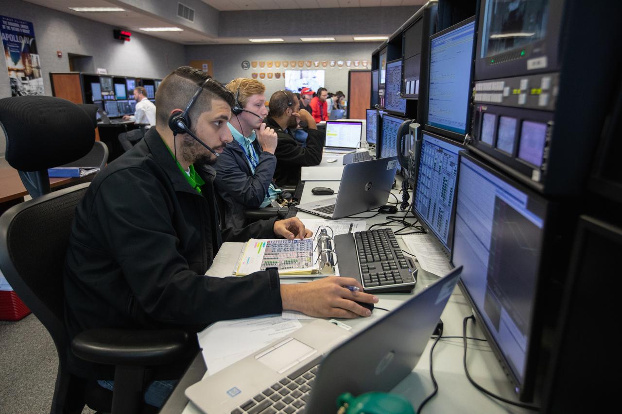 Members of the Artemis 1 launch team, including personnel with NASA’s Exploration Ground Systems (EGS) and Jacobs Test and Operations Contract (TOSC), monitor activities during the first formal terminal countdown simulation inside Firing Room 1 in the Launch Control Center at NASA’s Kennedy Space Center in Florida on July 12, 2019.  This was the first in a series of simulations to help the team prepare for the launch of Artemis 1, the uncrewed first flight of the Space Launch System rocket and Orion spacecraft. 