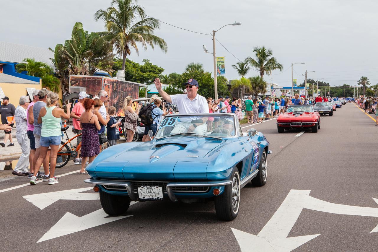 Retired NASA astronaut Jerry Ross rides in a classic Corvette during the "Man on the Moon" astronaut parade in Cocoa Beach, Florida, on July 13, 2019. The parade was held to honor the 50th anniversary of NASA's Saturn V/Apollo 11 launch and landing on the Moon.