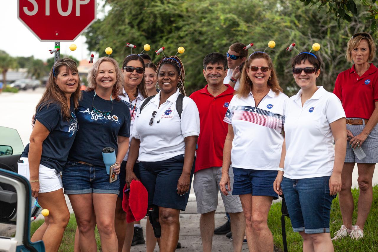 Employees from NASA’s Kennedy Space Center prepare to march in the “Man on the Moon” astronaut parade in Cocoa Beach, Florida, on July 13, 2019. The parade was held to honor the 50th anniversary of NASA’s Saturn V/Apollo 11 launch and landing on the Moon. 