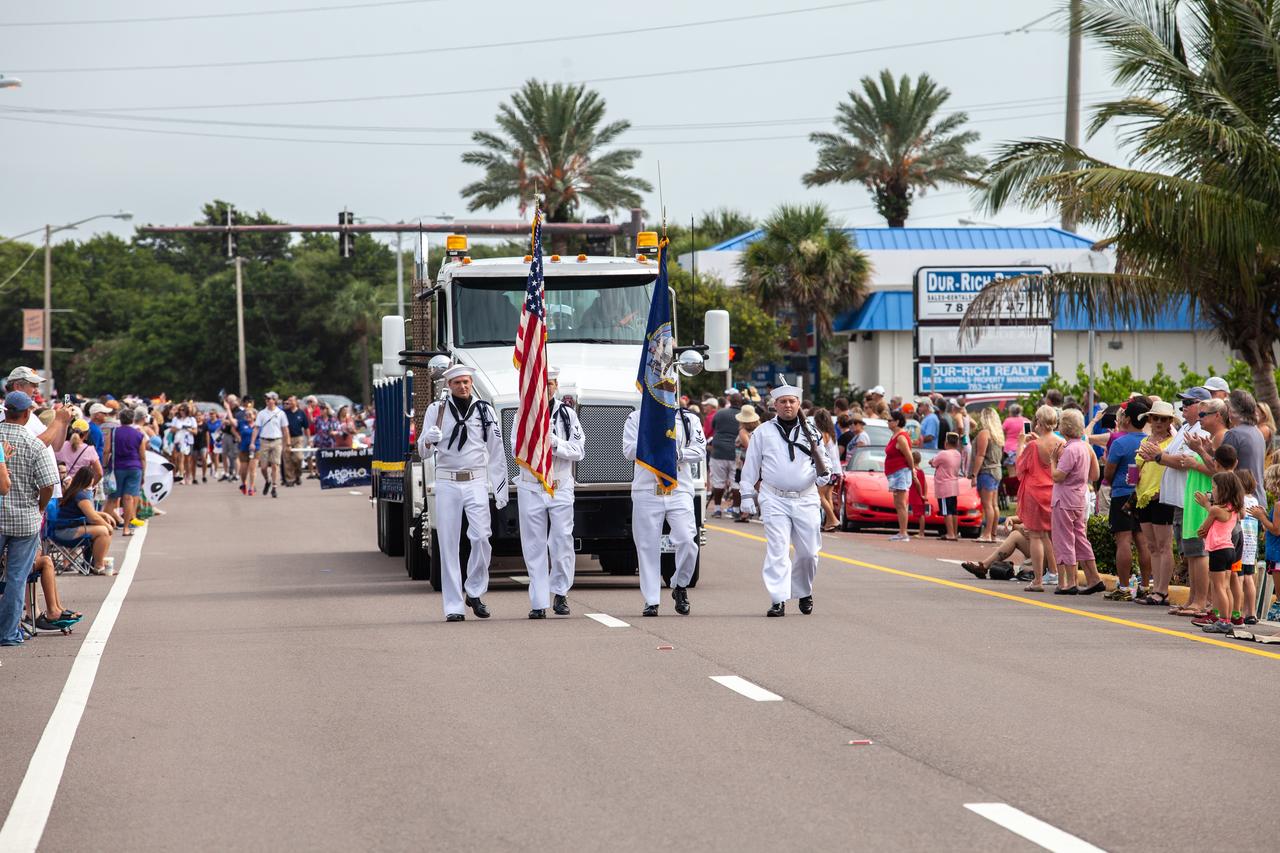 U.S. Navy active duty color guard open the "Man on the Moon" astronaut parade in Cocoa Beach, Florida, on July 13, 2019. The parade was held to honor the 50th anniversary of NASA’s Saturn V/Apollo 11 launch and landing on the Moon.