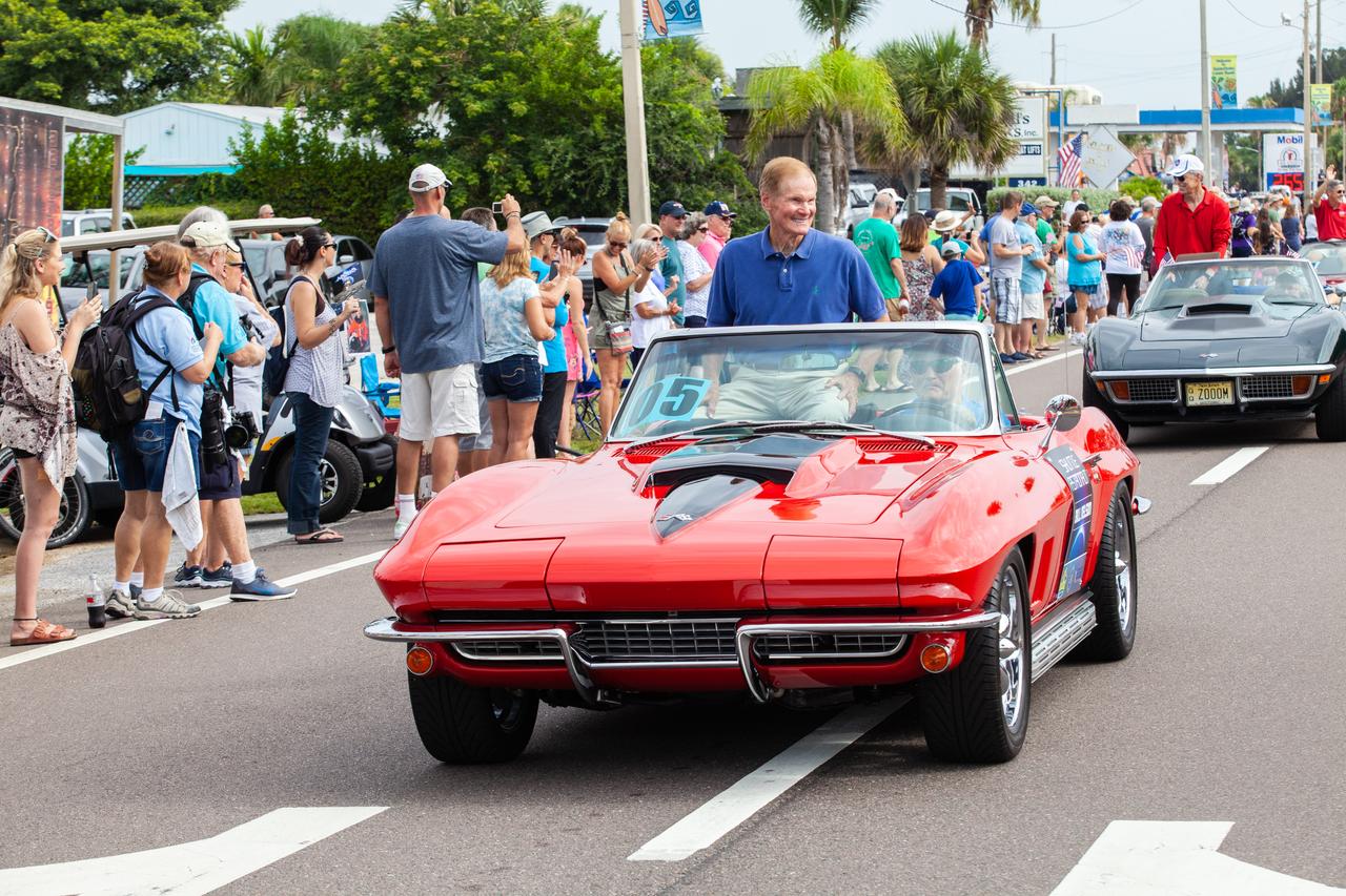 One-time shuttle astronaut and former U.S. Senator Bill Nelson rides in a classic corvetter during the "Man on the Moon" astronaut parade in Cocoa Beach, Florida, on July 13, 2019. The parade was held to honor the 50th anniversary of NASA’s Saturn V/Apollo 11 launch and landing on the Moon