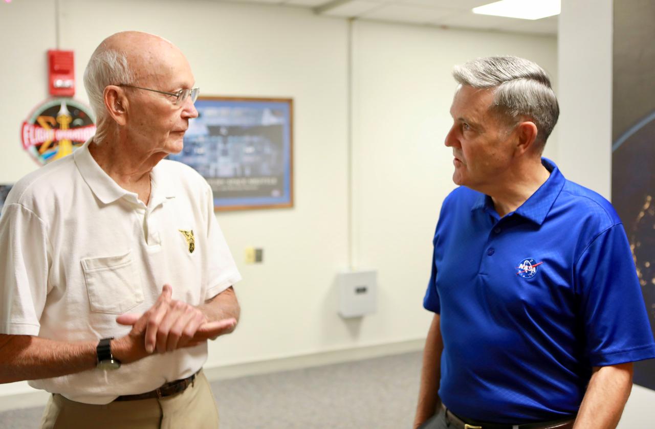 On the 50th anniversary of the Apollo 11 launch, July 16, 2019, astronaut Michael Collins, left,  speaks to Kennedy Space Center Director Bob Cabana in the astronaut crew quarters about the moments leading up to launch at 9:32 a.m. on July 16, 1969, and what it was like to be the first to land on the Moon.