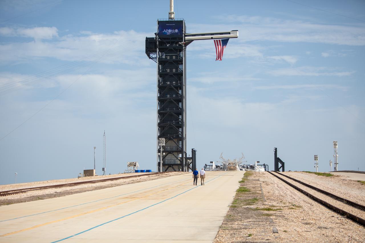 On July 16, 2019, the 50th anniversary of the Apollo 11 launch, Kennedy Space Center Director Bob Cabana, left, and astronaut Michael Collins take a walk at Launch Complex 39A. During his visit to the Florida spaceport, Collins discussed the moments leading up to launch at 9:32 a.m. on July 16, 1969, and what it was like to be part of the first crew to land on the Moon. 