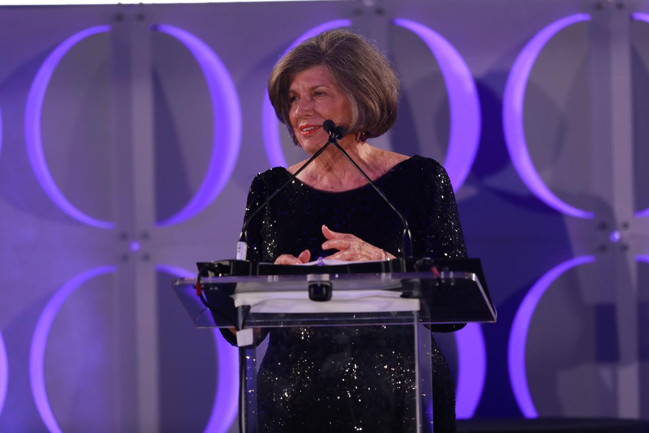 JoAnn Morgan, retired NASA engineer, makes remarks after receiving the Pioneer Award during the Apollo 11 50th Gala on July 16, 2019. The gala, presented by Northrop Grumman, was held inside the Apollo/Saturn V Center at the Kennedy Space Center Visitor Complex in Florida. Morgan was the first woman engineer on console at Kennedy Space Center and the only woman in the firing room during the Apollo 11 launch countdown and launch.