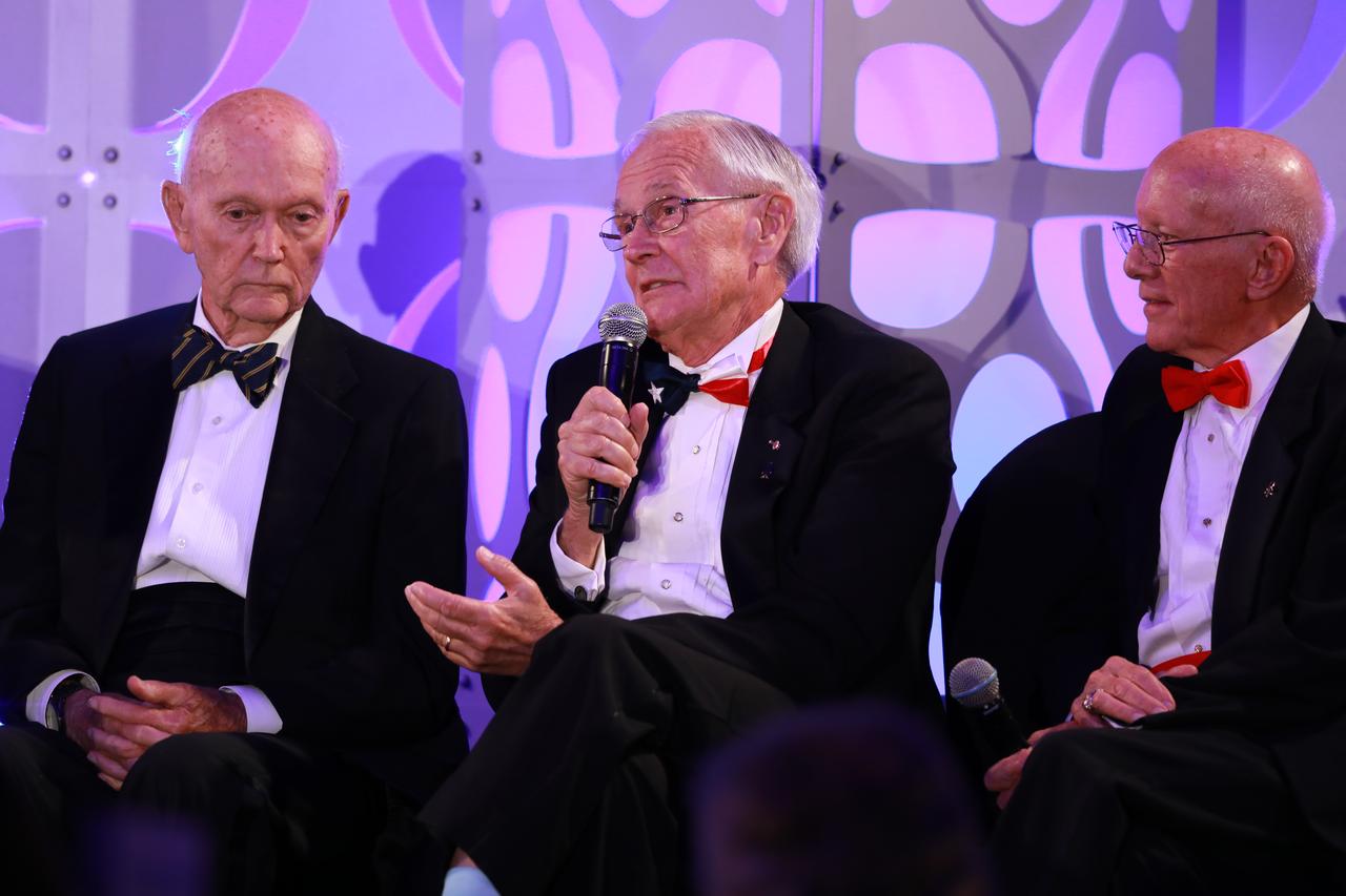 Retired NASA astronauts participate in a panel discussion during the Apollo 11 50th Gala, presented by Northrop Grumman, on July 16, 2019. The gala was held inside the Apollo/Saturn V Center at the Kennedy Space Center Visitor Complex in Florida. From left, are Apollo 11 astronaut Michael Collins, Apollo 16 astronaut Charlie Duke, and Apollo Flight Director Gerry Griffin.