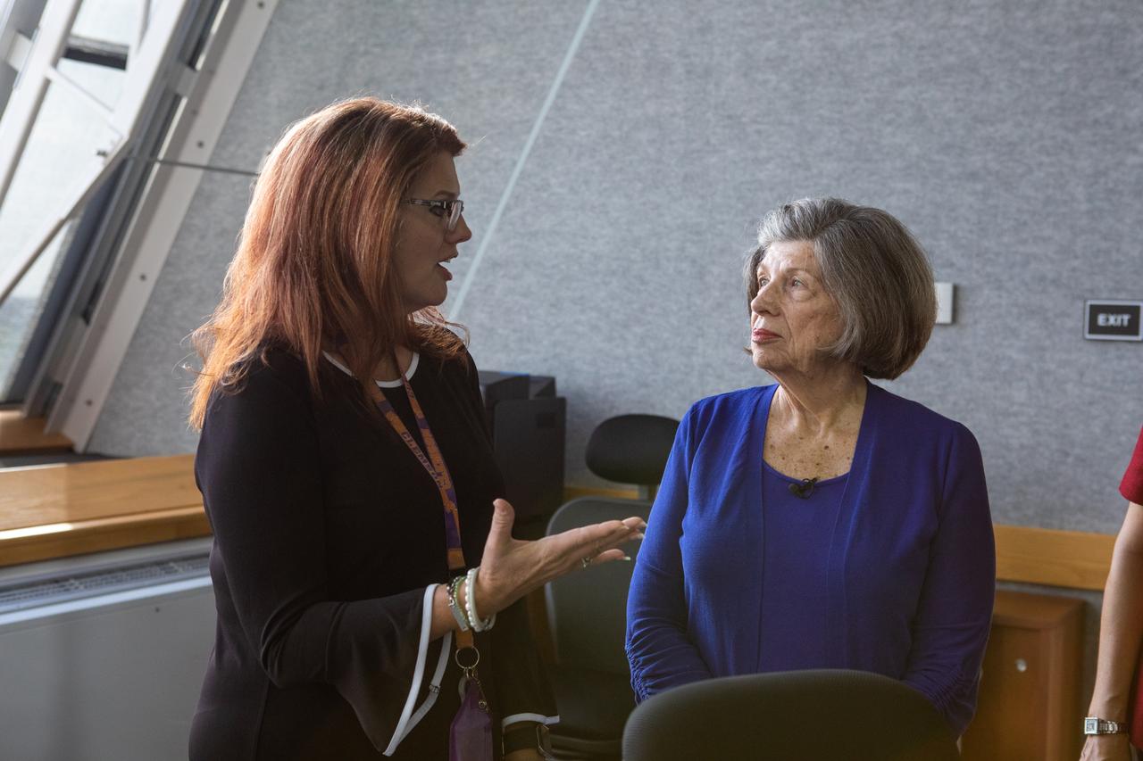 On July 16, 2019, the 50th anniversary of the Apollo 11 launch to the Moon, Artemis 1 Launch Director Charlie Blackwell-Thompson, left, talks with Apollo-era launch team member JoAnn Morgan in Launch Control Center Firing Room 1 at NASA's Kennedy Space Center in Florida. Morgan was the only woman in the firing room during Apollo 11 countdown activities. Blackwell-Thompson is the first female launch director. Apollo 11 launched atop the Saturn V rocket at 9:32 a.m. on July 16, 1969.