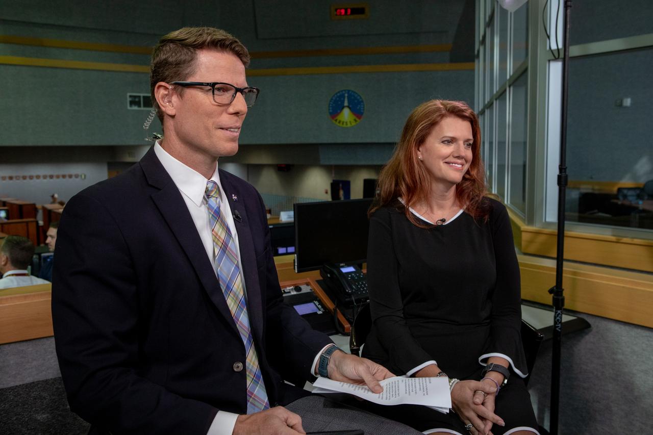 On July 16, 2019, the 50th anniversary of the Apollo 11 launch, Artemis 1 Launch Director Charlie Blackwell-Thompson, right, talks to NASA’s Derrol Nail at the agency’s Kennedy Space Center in Florida about our plans to return to the Moon.
