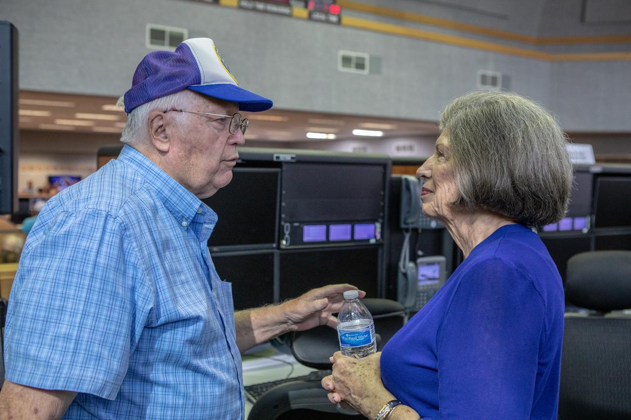 On July 16, 2019, the 50th anniversary of the Apollo 11 launch to the Moon; Apollo launch team member JoAnn Morgan, right, talks with a fellow team member in Launch Control Center Firing Room 1 at NASA's Kennedy Space Center in Florida. Morgan was the only female in the firing room during Apollo 11 launch countdown activities.
