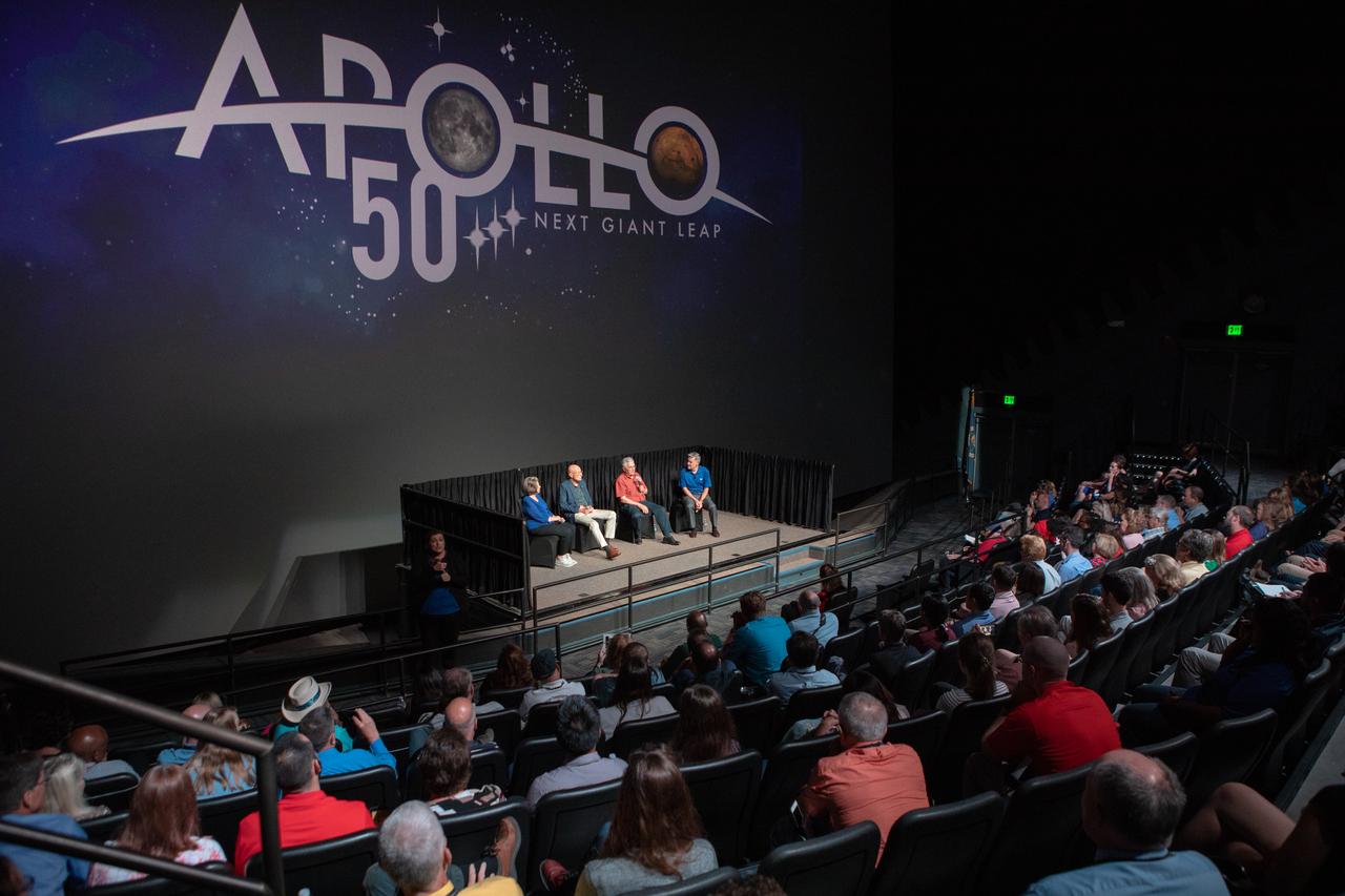 NASA Kennedy Space Center Director Bob Cabana, far right, serves as moderator for the “Apollo Heroes Panel Discussion” in the IMAX Theater at the Kennedy Space Center Visitor Complex in Florida on July 16, 2019. Panelists are, from left, JoAnn Morgan, the only woman on console in the Launch Control Center for Apollo 11 launch countdown activities; Bob Sieck, Apollo-era launch team member and former space shuttle launch director; and Harrison Schmitt, Apollo 17 astronaut and moonwalker. The panel discussion is one of several events at the visitor complex to honor the 50th anniversary of NASA’s Saturn V/Apollo 11 launch and landing on the Moon.