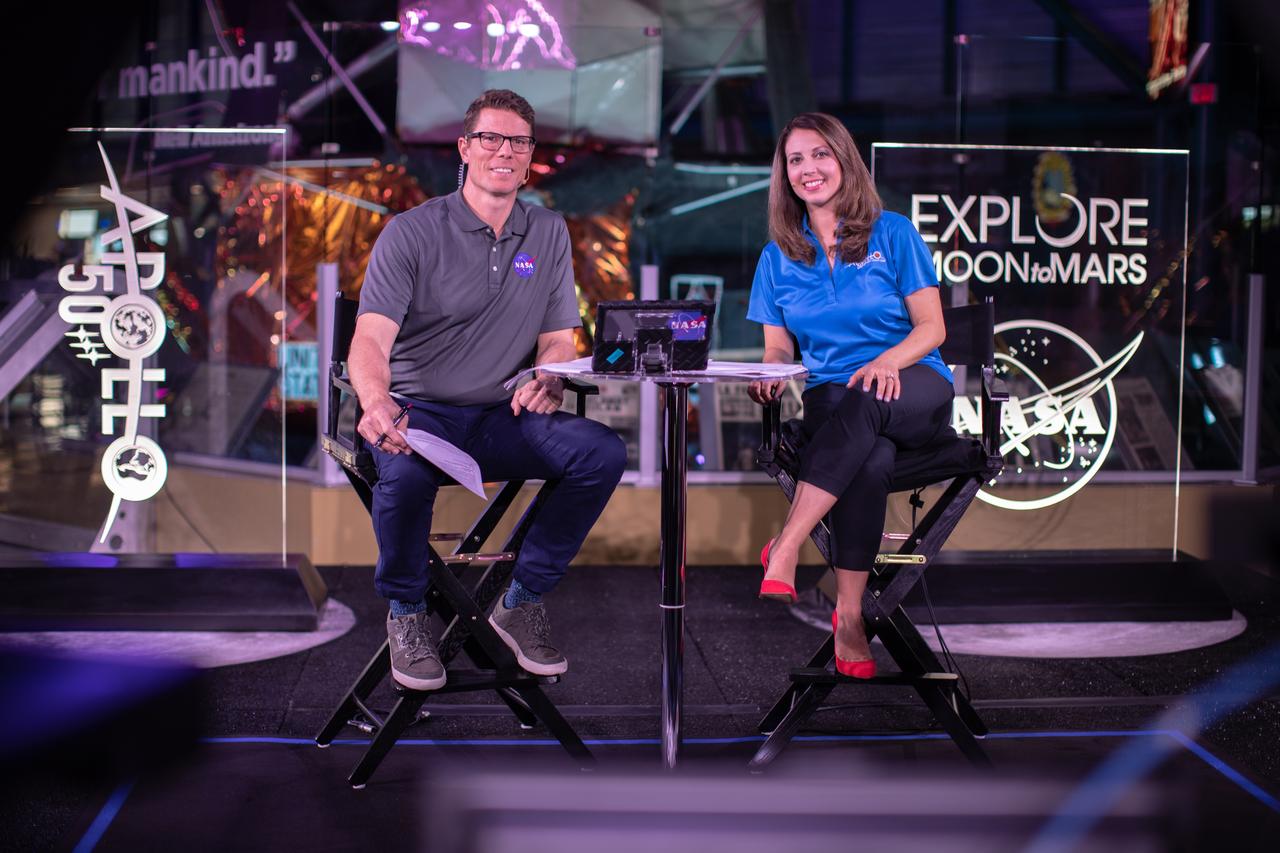 Derrol Nail, left, and Marie Lewis, NASA Office of Communications, host a special Apollo 11 show titled “NASA’s Giant Leaps: Past and Future” on July 19, 2019. The show, which honored the heroes of Apollo and examined NASA’s future plans, was broadcast live from Kennedy Space Center’s Apollo/Saturn V Center in Florida. It featured segments from across the nation, including The National Mall in Washington, NASA’s Johnson Space Center in Houston, Neil Armstrong’s hometown of Wapakoneta, Ohio, and the Apollo 11 command module on display at the Museum of Flight in Seattle.