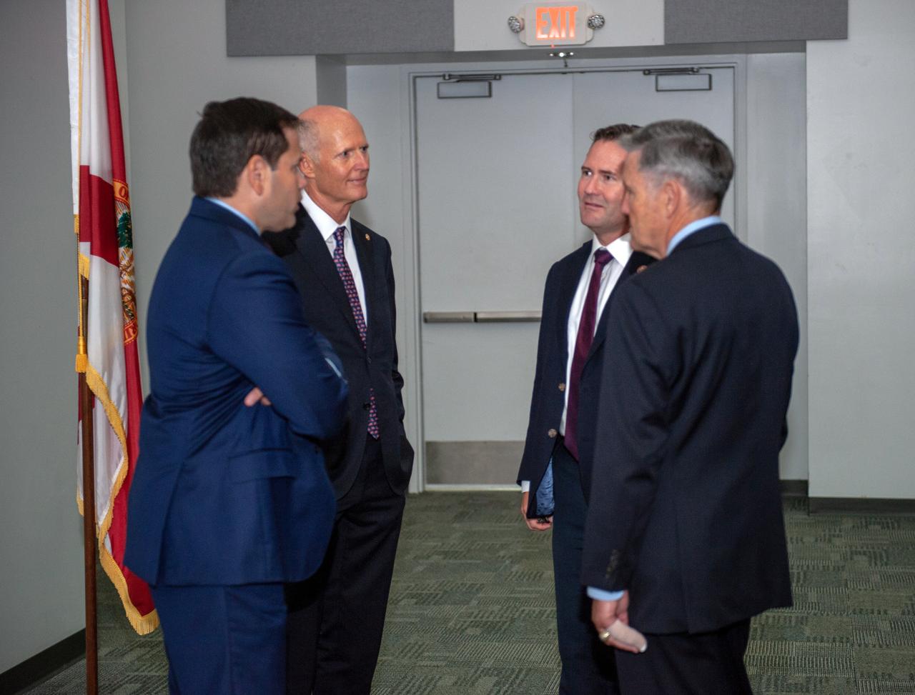 From left, Sens. Marco Rubio and Rick Scott, R-FL, and Rep. Mike Waltz, R-FL, speak with Kennedy Space Center Director Bob Cabana during the U.S. Senate Committee on Small Business and Entrepreneurship field hearing on July 19, 2019, in the Astronaut Memorial Foundation facility at the Florida spaceport’s visitor complex. The topic of the field hearing was “Moon Landings to Mars Exploration: The Role of Small Business Innovation in America’s Space Program.”