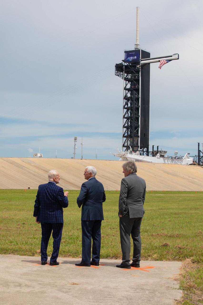 Vice President Mike Pence, center, celebrates the 50th anniversary of the Apollo 11 Moon landing during a visit to Kennedy Space Center’s Launch Complex 39A on July 20, 2019. Neil Armstrong, Buzz Aldrin and Michael Collins launched from Pad 39A aboard a Saturn V rocket on July 16, 1969. Four days later, Armstrong and Aldrin landed the Apollo Lunar Module Eagle on the Moon, becoming the first two humans to walk on the lunar surface. Pence recognized the extraordinary achievements of the Apollo 11 team, while looking forward to NASA’s plans to return to the Moon and on to Mars. At left is Apollo 11 Lunar Module Pilot Buzz Aldrin. At right is Rick Armstrong, son of Apollo 11 Commander Neil Armstrong. 