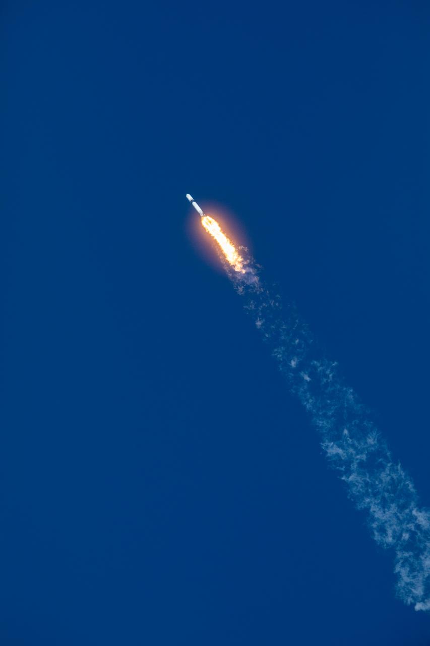 A SpaceX Falcon 9 rocket soars upward after its liftoff from Space Launch Complex 40 at Cape Canaveral Air Force Station in Florida at 6:01 p.m. EDT on July 25, 2019, carrying the Dragon spacecraft on the company’s 18th Commercial Resupply Services (CRS-18) mission to the International Space Station.  The uncrewed Dragon spacecraft will deliver about 5,000 pounds of science and research, crew supplies and vehicle hardware to the orbiting laboratory. 