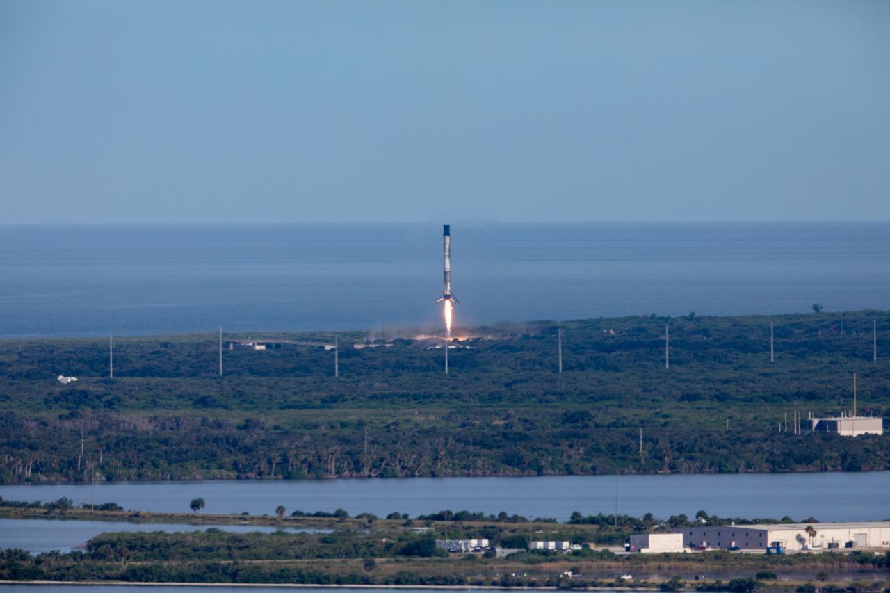 After boosting a SpaceX Dragon spacecraft on its way to the International Space Station for the company’s 18th Commercial Resupply Services mission, the first stage of the Falcon 9 rocket returns to Landing Zone 1 at Cape Canaveral Air Force Station in Florida on July 25, 2019. The rocket lifted off minutes earlier, at 6:01 p.m. EDT, from Space Launch Complex 40 at the Cape. The uncrewed Dragon spacecraft will deliver about 5,000 pounds of science and research, crew supplies and vehicle hardware to the orbiting laboratory.